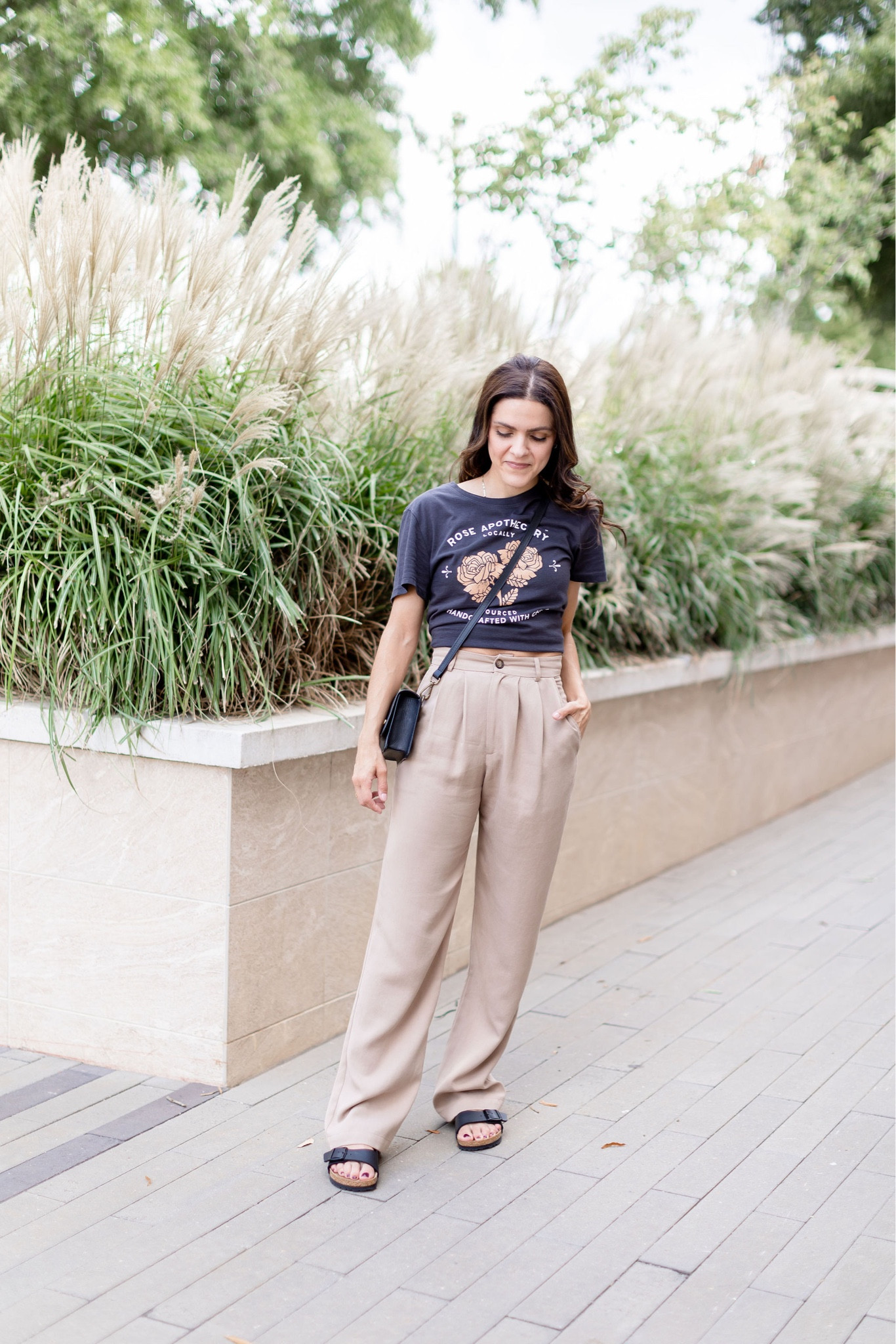 September mini capsule outfit idea: graphic tee, tan trouser, Birkenstocks, mare belt bag 

#LTKstyletip #LTKSeasonal