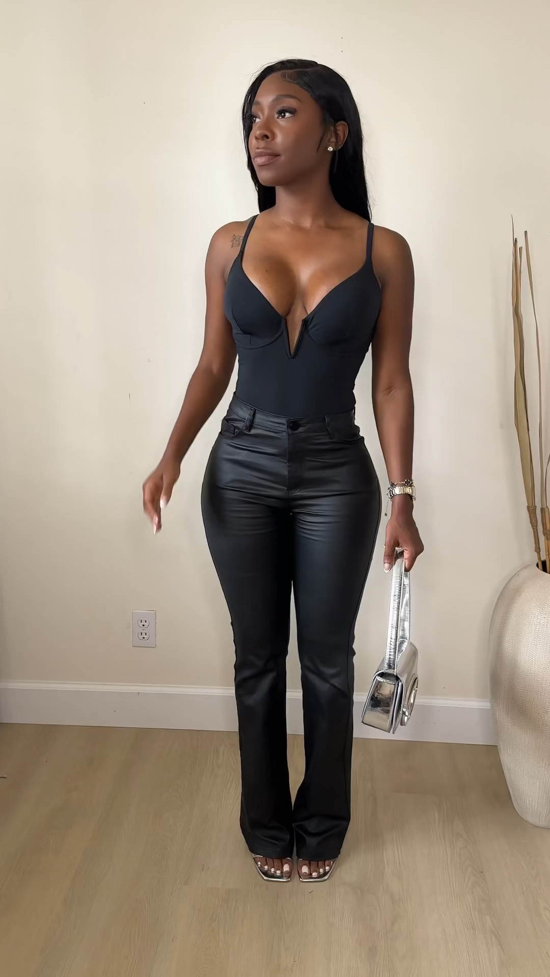 Deep V corset from populish. Styled with some leather pants and metallic accessories 

#LTKstyletip #LTKfindsunder100 #LTKVideo