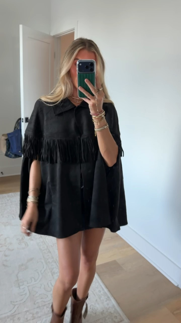 Walmart size s/m Wrap yourself in effortless sophistication with this Faux Suede Fringe Cape from Scenario. The soft, drapey finish gives it a luxe, suede-like feel, and long fringe trim adds movement and a touch of boho elegance. Designed for easy layering, it slips over sweaters, long-sleeve tops or dresses to elevate your look without added bulk. A versatile statement piece that transitions seamlessly from day to night. Only at Walmart.