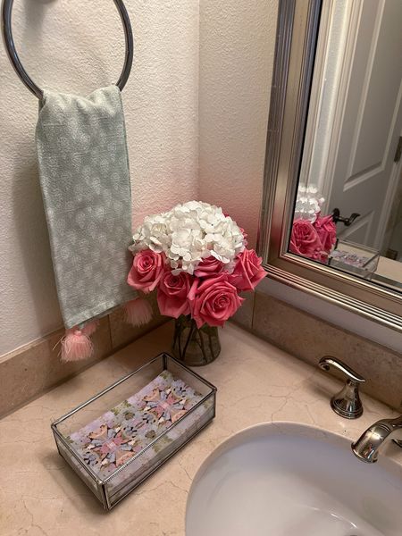 Never underestimate how much decor can brighten up a space. Here is what I currently have in my powder bath. The guest towels are from Laura Park, but I cannot link through LTK.

#LTKHome #LTKSeasonal #LTKParties