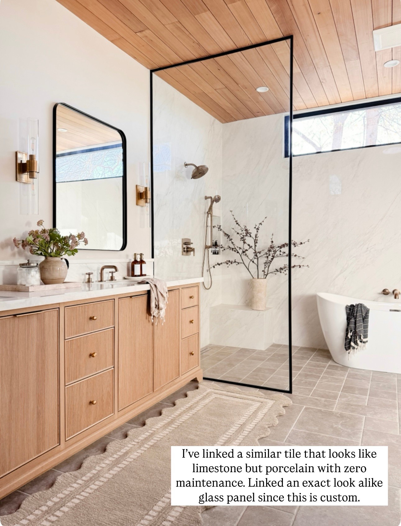 Linked similar designer looks for less as well as the actual products. Wood vanity, glass, shower panel, gray runner, gray tile, white deep, soaking tub picture of bra sconces, black rectangular mirror medicine cabinet.

#LTKHome #LTKFindsUnder100 #LTKSaleAlert