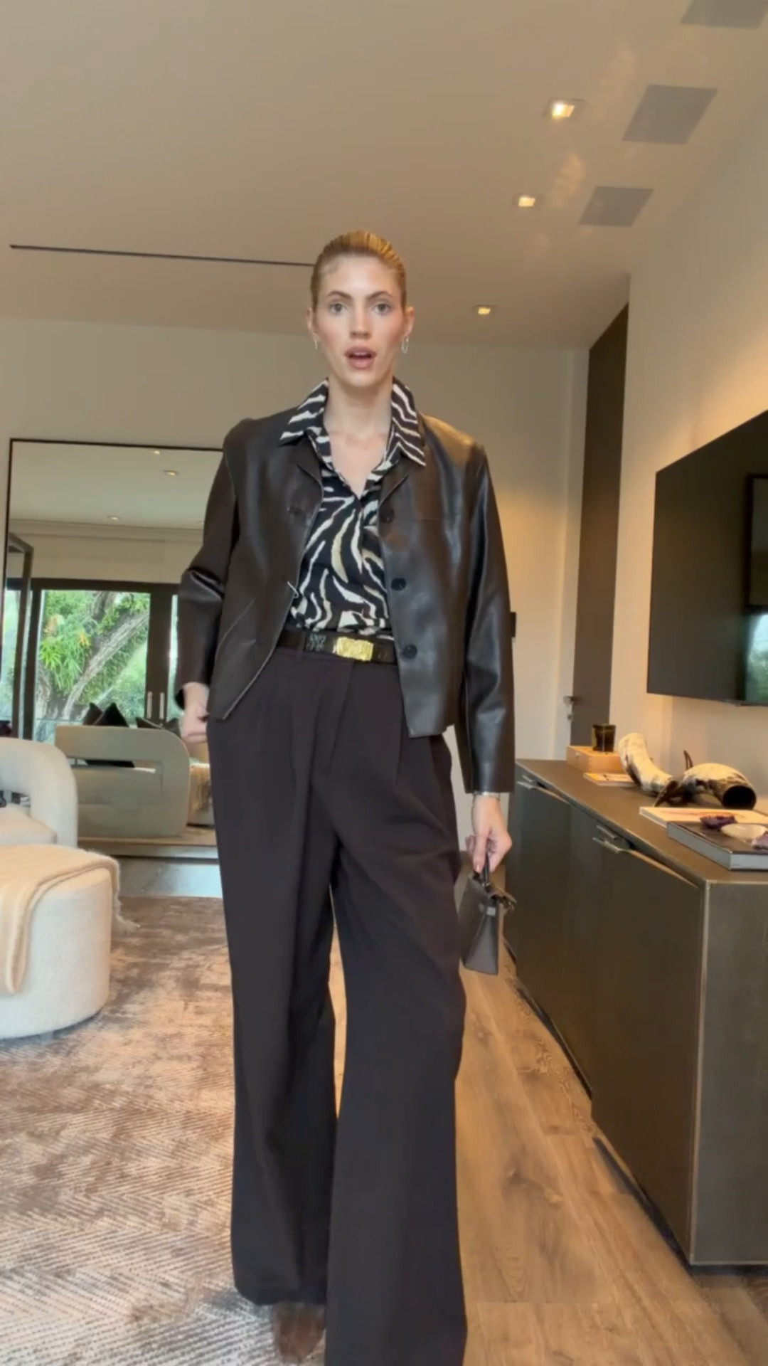 I am obsessed with this zebra print blouse and it is so timeless!✨ Paired it with this chocolate brown leather jacket and trousers. 

#LTKootd #LTKSeasonal #LTKgrwm