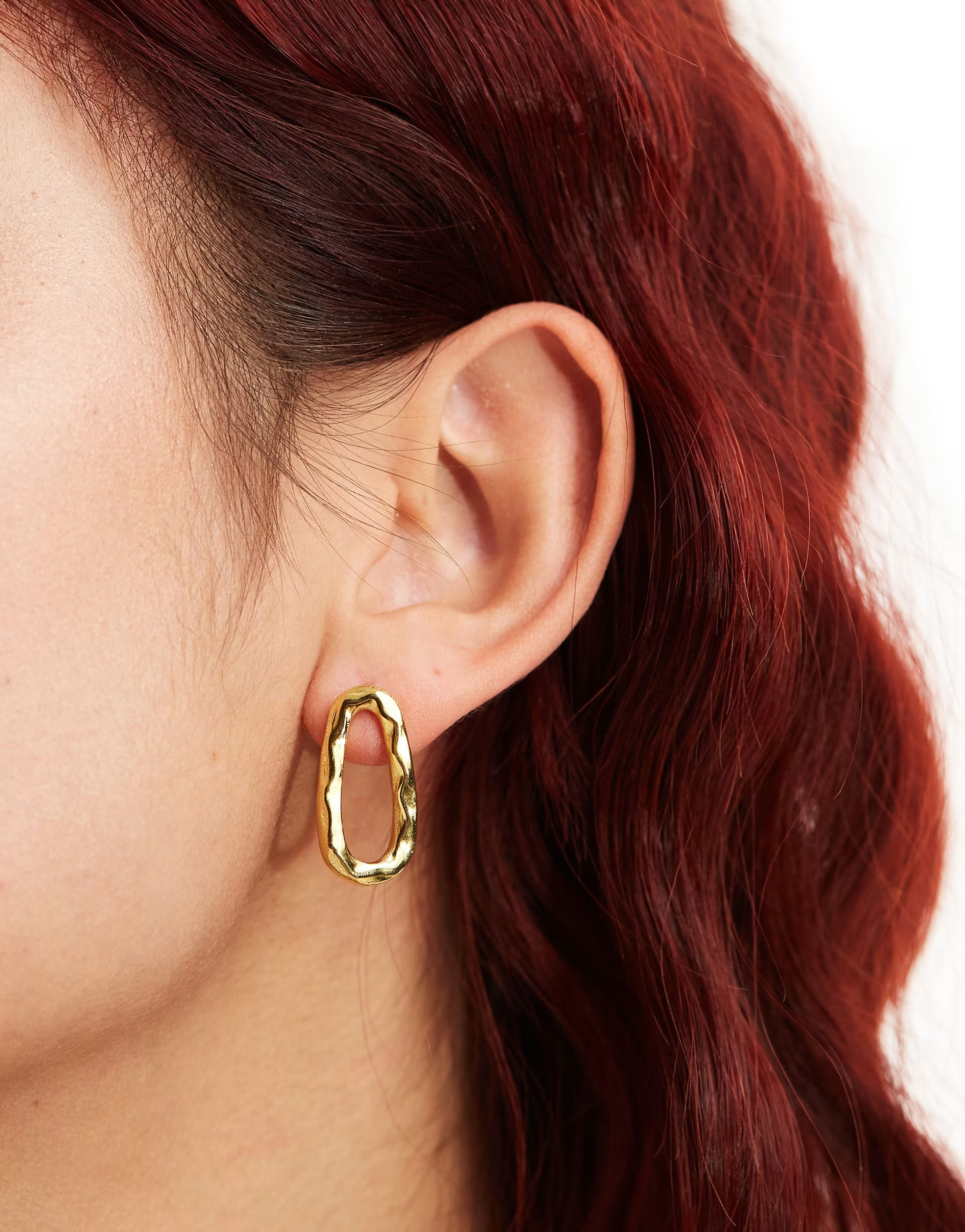 Lost Souls stainless steel wavy stud earrings in 18k gold plated | ASOS (Global)