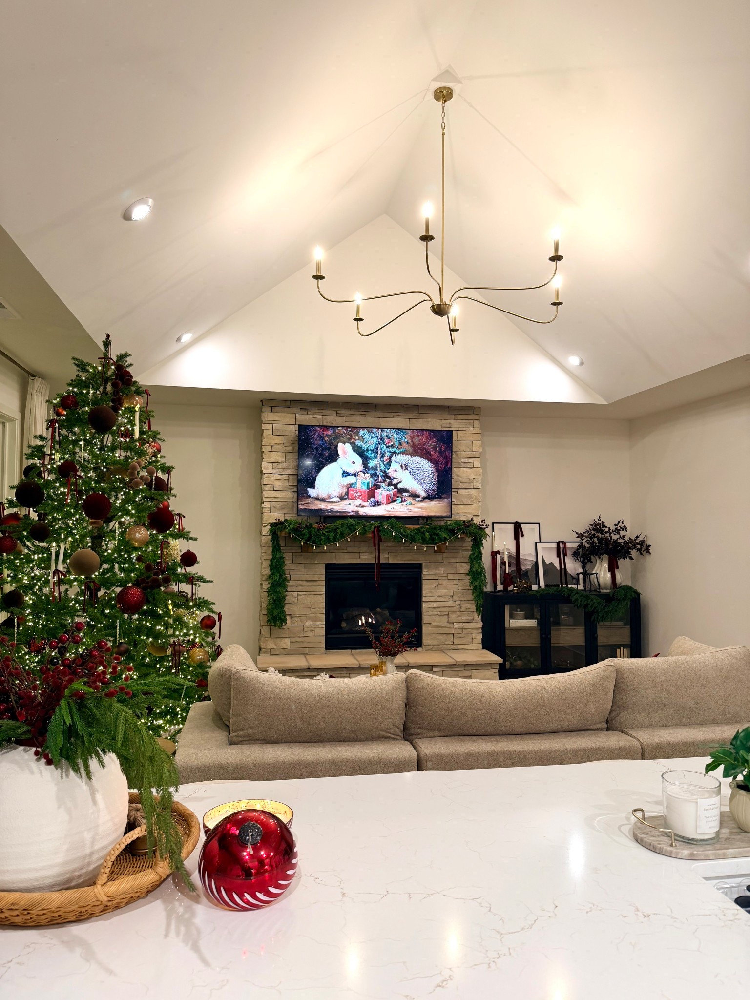 Cozy Old World Christmas 2025 living room and kitchen space. 

#LTKHoliday #LTKFindsUnder100 #LTKHome