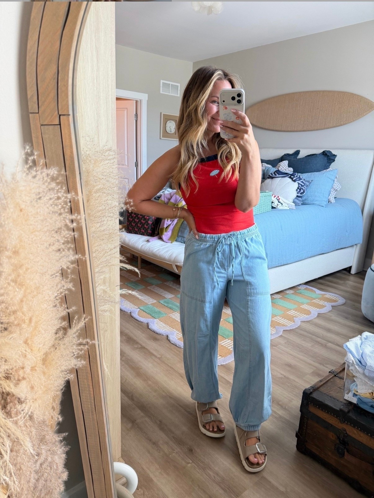 Red, white & cute ❤️🤍💙

This outfit is giving effortless summer style. The pop of red tank, lightweight chambray joggers, and comfy buckle sandals are the perfect combo for everything from weekend errands to backyard BBQs. Easy, flattering, and comfortable enough to wear all day long.

#summeroutfit #casualsummerstyle #redwhiteandblue #memorialdaystyle #fourthofjulyoutfit #chambraypants #everydayoutfit #momstyle #comfortablefashion #summerfashion #affordablestyle #weekendoutfit #ltkfashion #ltkstyle #amazonfashion
