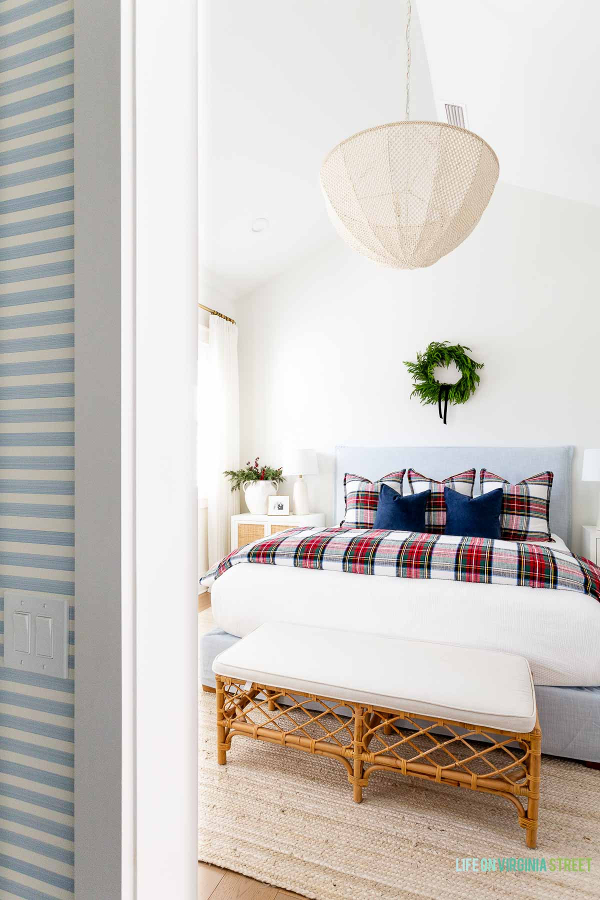 Coastal Christmas bedroom // Holiday bedroom decor // chandelier // wreath // christmas plaid // Ralph Lauren style 

 #LTKHoliday #LTKSeasonal #LTKHome