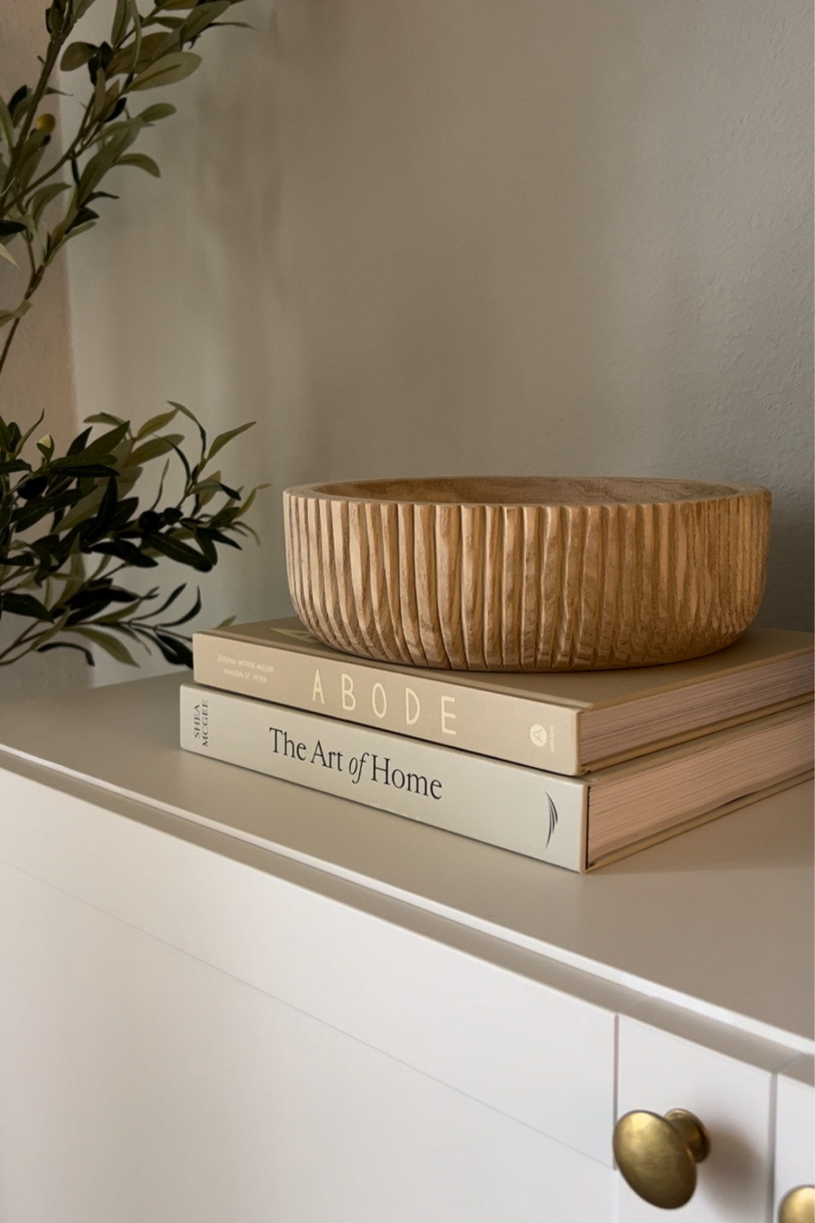 Decorative books for our tv stand with the cutest hobby lobby bowl 

#LTKHome #LTKFindsUnder50