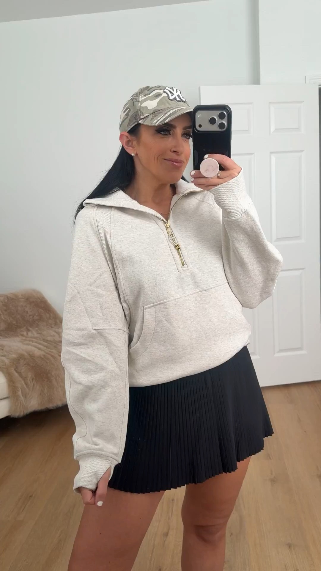 Lululemon varsity high rise pleated tennis skirt now $39 originally $88 in the color rock melon

Scuba oversized funnel neck half zip sweatshirt now $45 off in black 