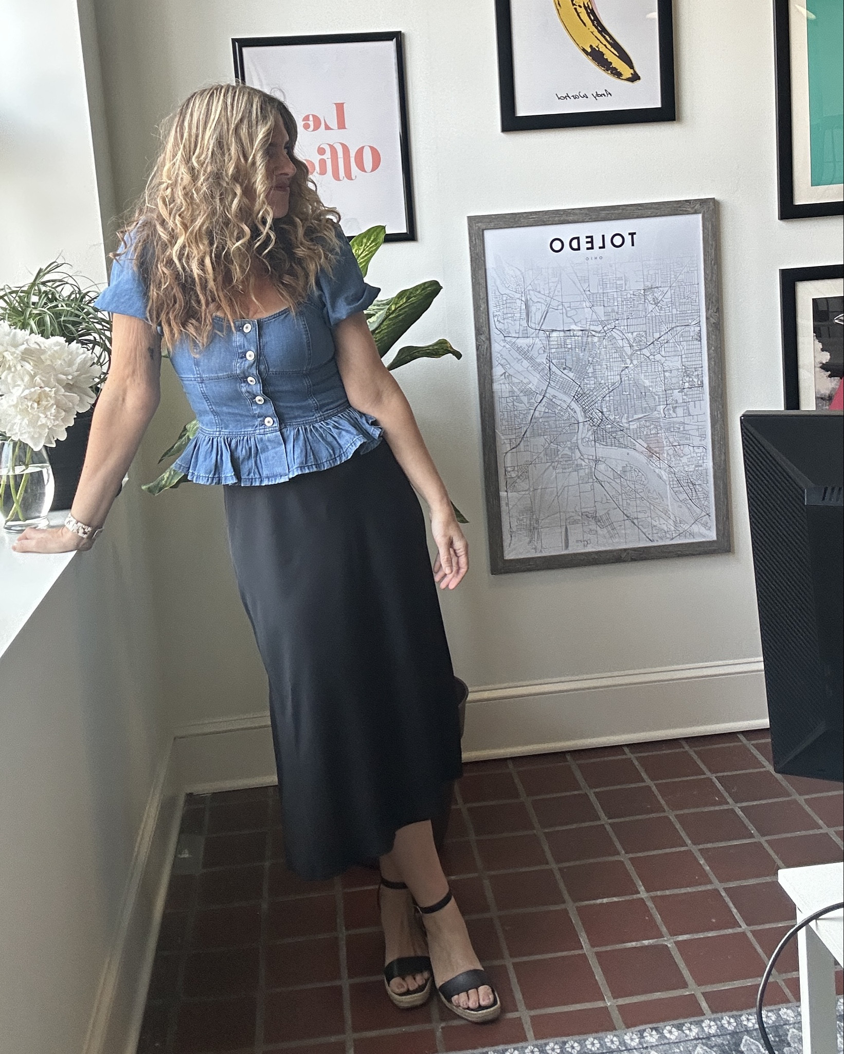 A boho peasant denim top with slinky black skirt  