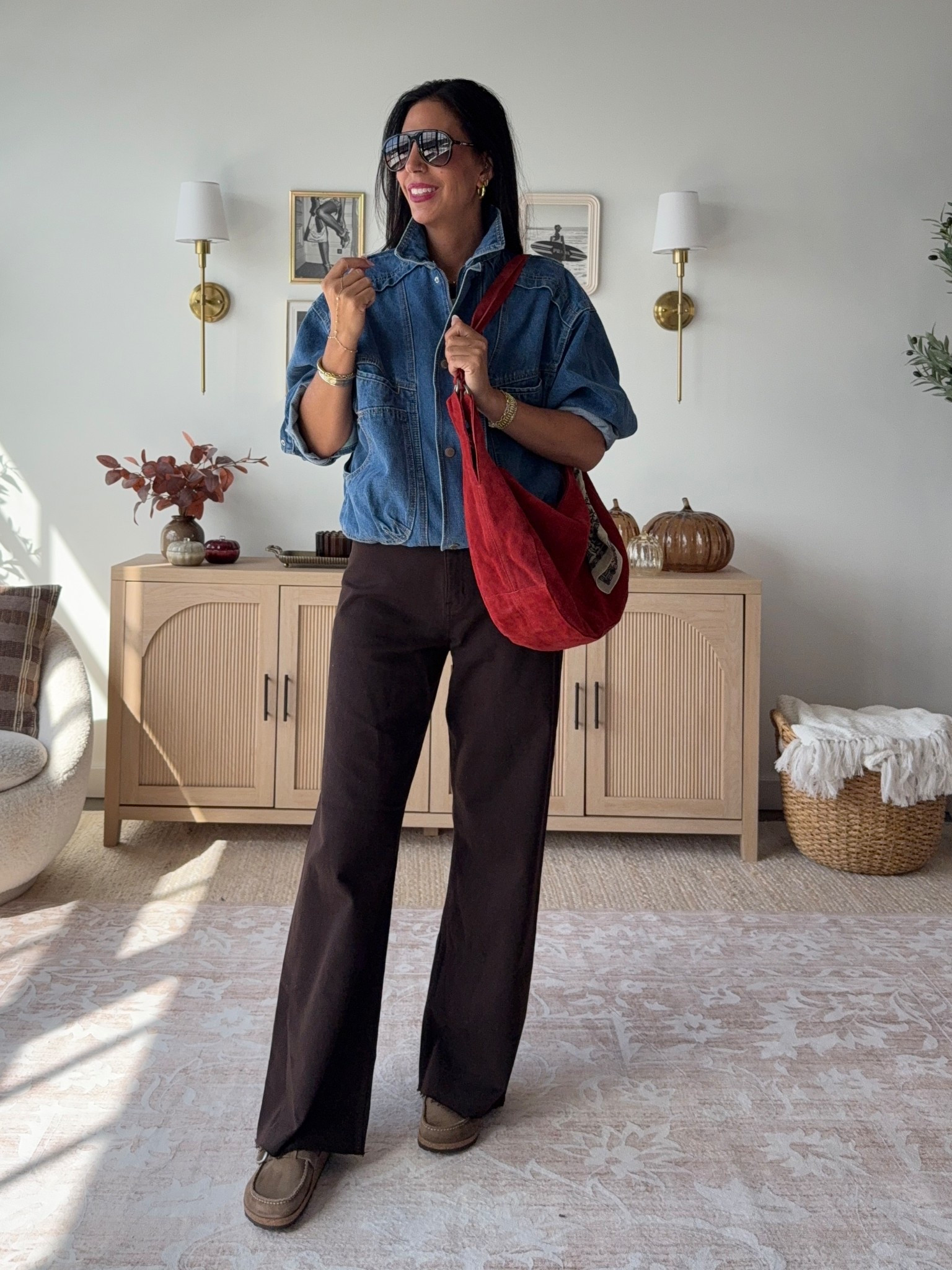 Make running errands cute and comfortable- and still chic 
With a light pair of wide leg pants, loafers or a comfy shoe, and a denim jacket. Add a pop of color with this suede bag that holds so much! 
Jacket- small 
Pants - size 27 (run a little big) 
Birkenstocks are tts 


#LTKSeasonal #LTKOver40 #LTKU