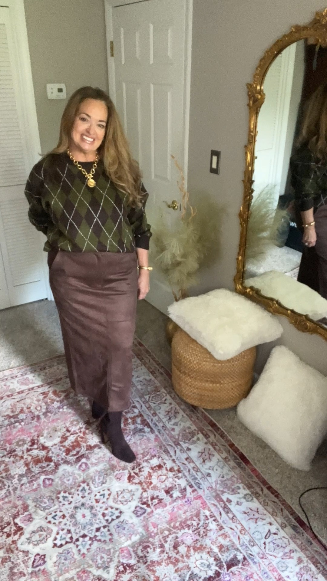 Mossy green and chocolate argyle sweater paired with a faux suede skirt!

#LTKootd #LTKWorkwear #LTKTravel