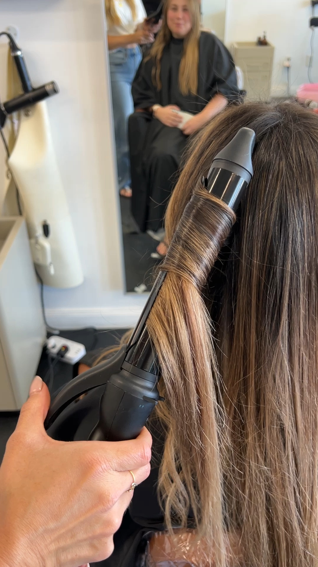 Say hello to the only curling iron you will ever want or need. I always say it’s like if a wand and a traditional curling iron had a baby it would be this. The hair glides so easily through the iron and because the barrel is longer you can get more hair curled at a time with ease. It also leaves your hair soft and shiny— I recommend staying in the 290-350 degree range if you are slower at curling your hair 

#LTKVideo #LTKBeauty #LTKStyleTip