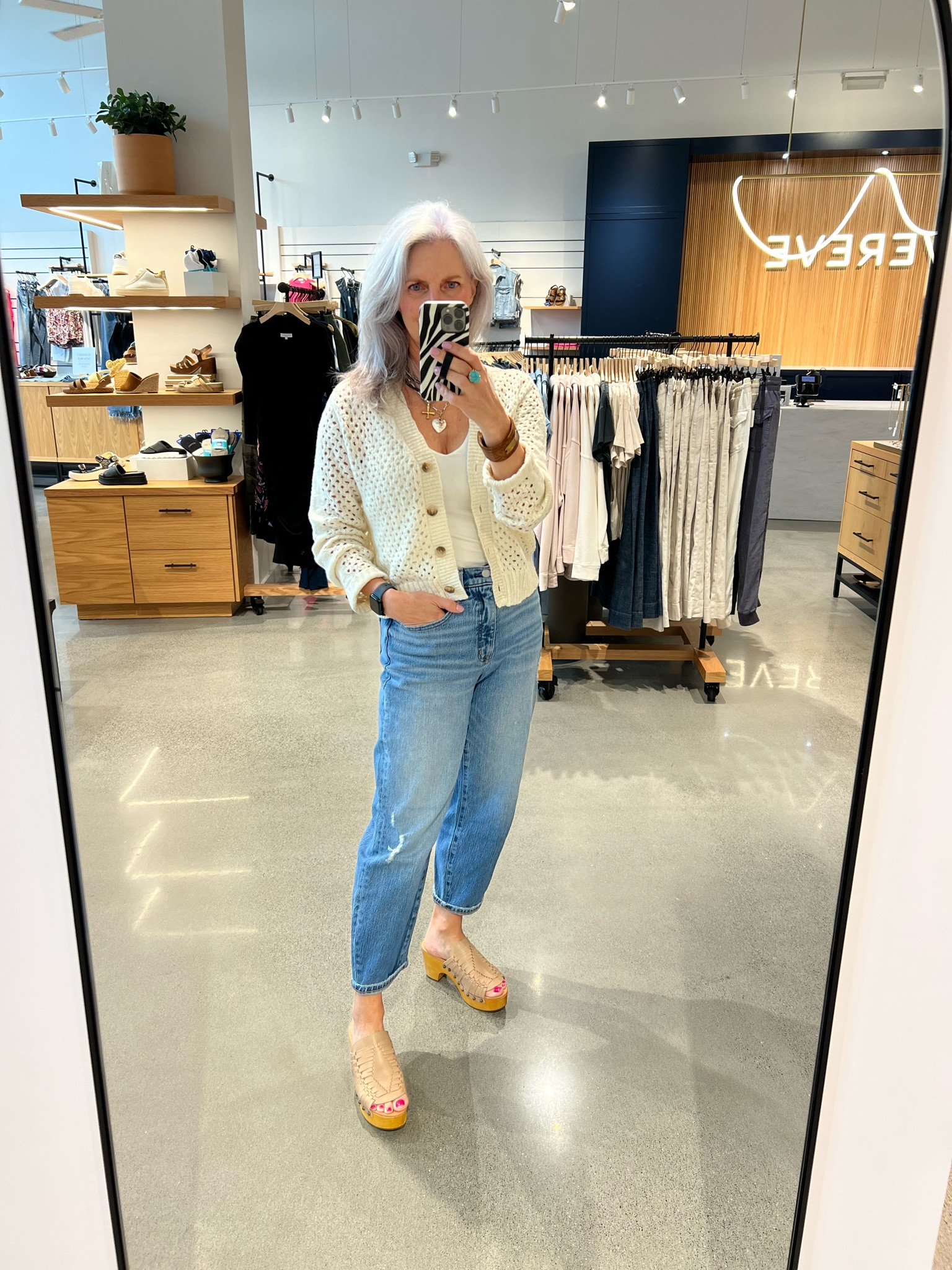 Open weave sweaters are hot right now! This cardi is a great layering piece. You can also wear it backwards with the buttons down the back. 

Evereve, evereve style, barrel jeans, open weave sweater

#LTKStyleTip