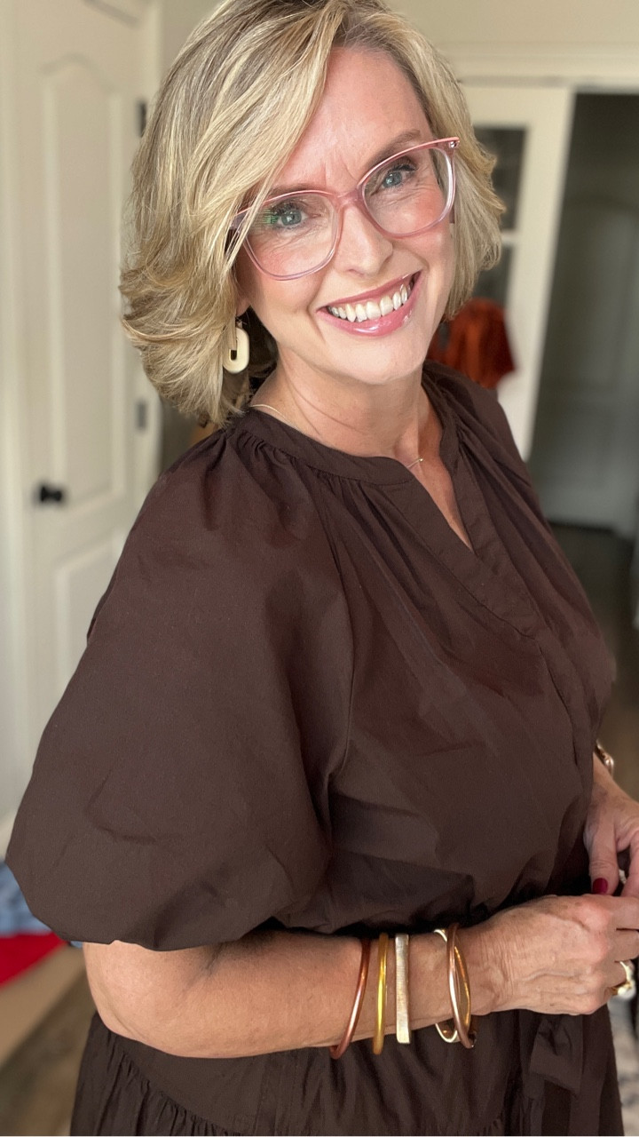 100% cotton and affordable! And it has pockets! It’s sure to sell out so grab it while you can. Available in a gorgeous blue print and black as well as this rich brown  

#LTKMidsize #LTKWorkwear