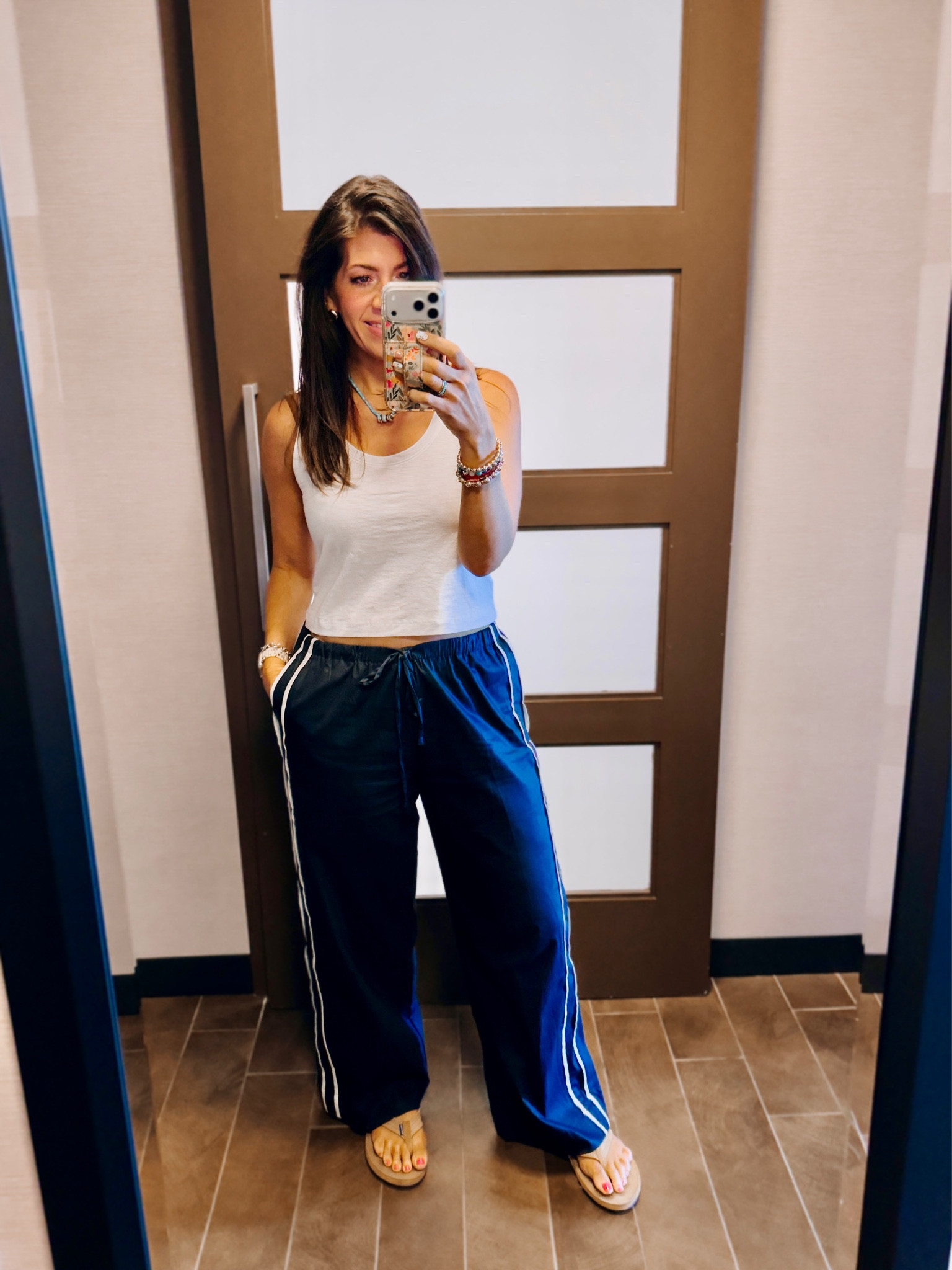In a medium tank and medium pants

#LTKMidsize #LTKTall #LTKSaleAlert