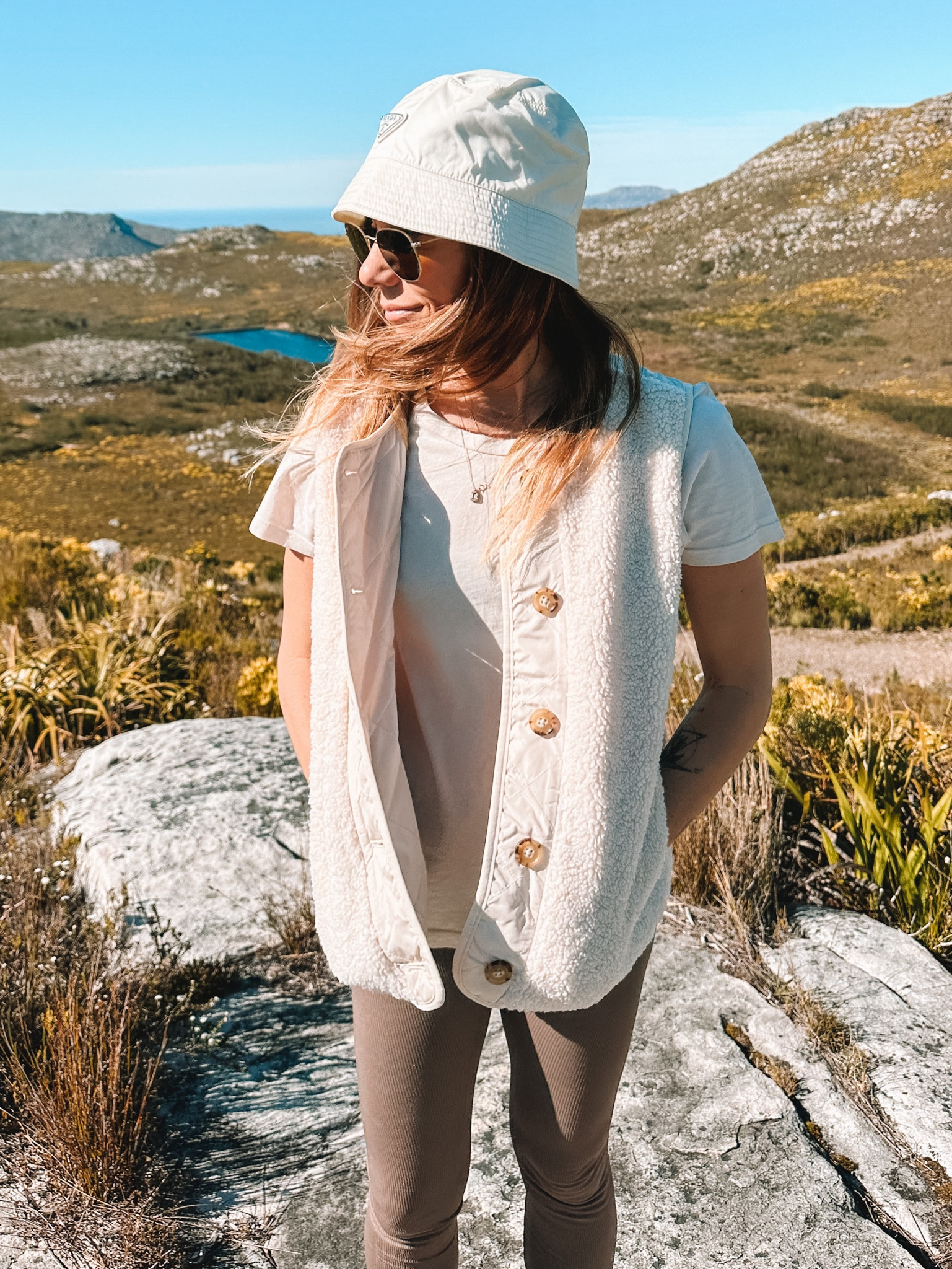 I can’t take off this reversible j.crew vest 🥲
I love that the best has a quilted side & a fuzzy side. I wear both!
Class Tshirt is Jcrew, and leggings are all yoga. 
The brads bucket hat really elevates the look. 
Ps: this color legging is discontinued, but tagged the black version 🙏🏼

#LTKSeasonal #LTKtravel #LTKstyletip