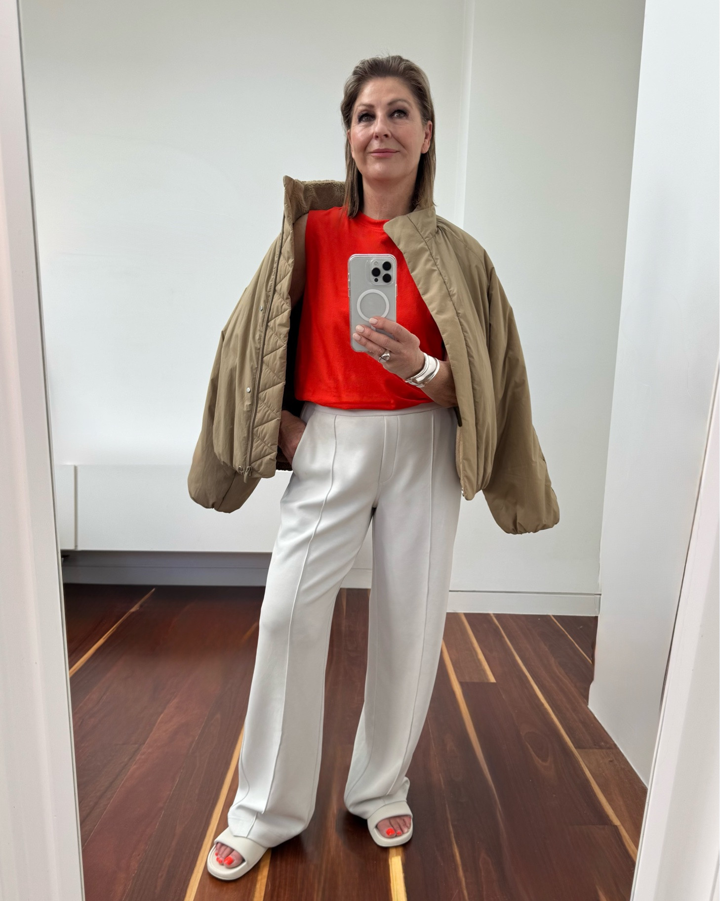 A little bit of colour ! 
A touch of orange goes a long way:
Layer an orange tank under a camel fleece lined jacket with white slouchy pants. It’s a trans seasonal look !
I’m wearing a large in the organic cotton tank and it’s very long : go down a size . 
 
Let’s talk about this  jacket !
It’s so warm, fleece lined ✔️
Water resistant ✔️
Tpuff sleeves add a fashion edge ✔️
The funnel neck chic AND warm✔️
Elastic hem & cuffs ✔️
I’m wearing a large and it’s big so go down a size if you prefer neater look ✔️

Shop these pieces and all my favorite pieces this month @lululemonanz

#LTKaustralia #LTKover50style #LTKstyletip