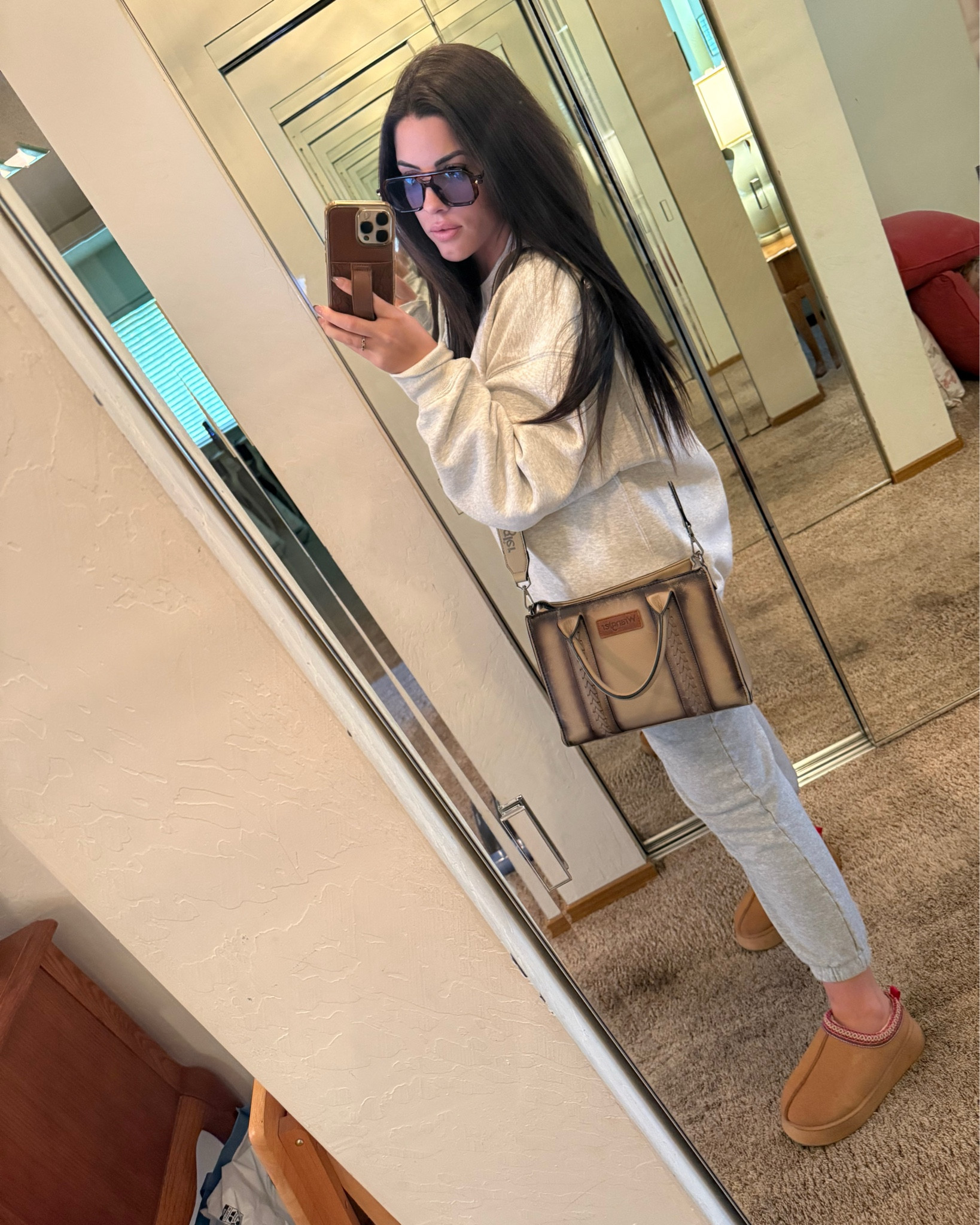 There’s been a little cold front and I am not mad about it 🥶☁️ Nothing better than slipping into warm, cozy sweats and my dupe UGG slippers 🙌. Linking my comfy pieces that are perfect for cozy mornings or lazy days at home 💕

#LTKStyleTip #LTKActive #LTKTravel