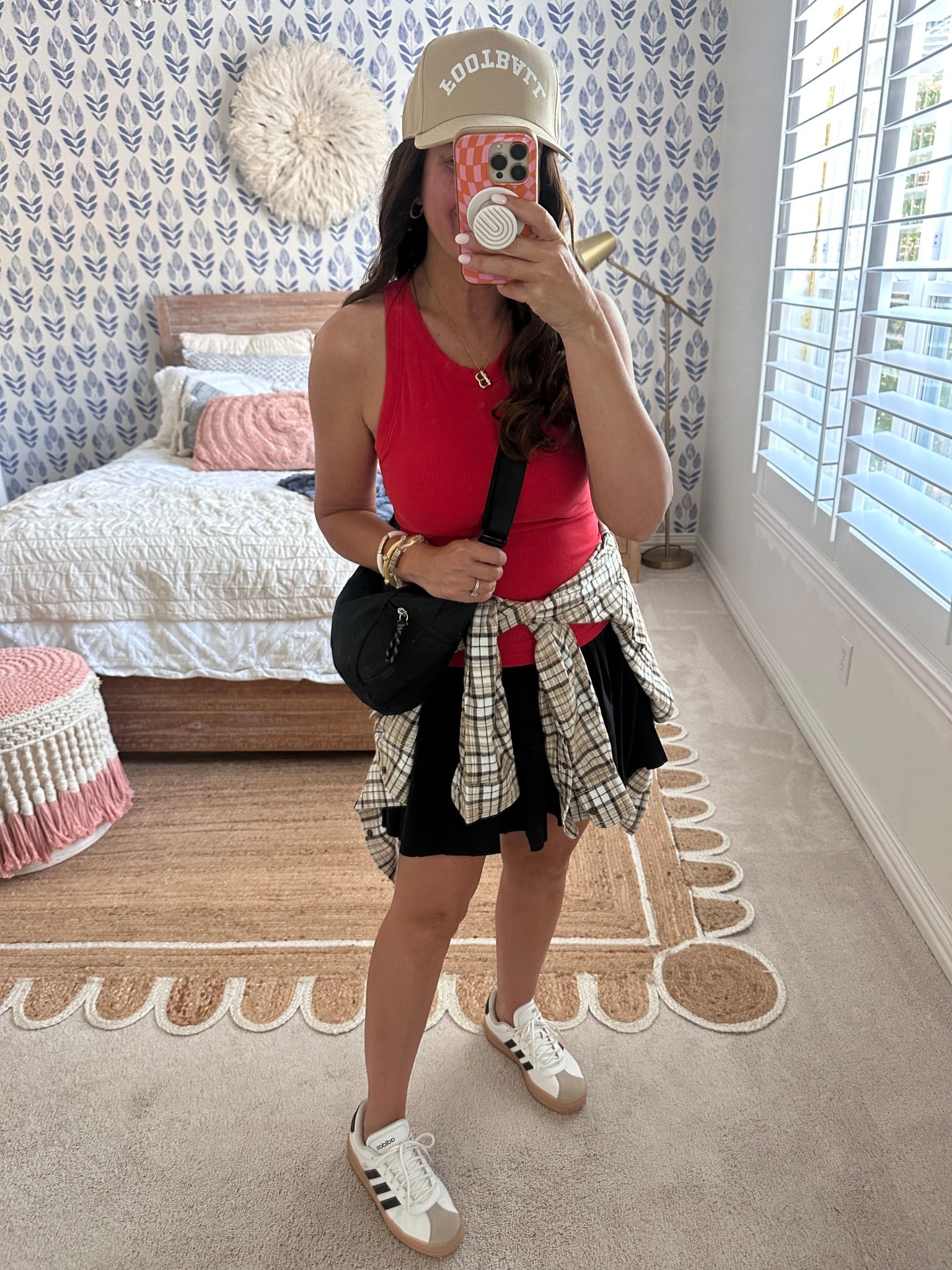 Gameday/football mom fit! Tank has a built in bra. Skirt has built in shorts. Wearing a medium in both! 
.


#LTKFindsUnder50 #LTKOver40 #LTKActive