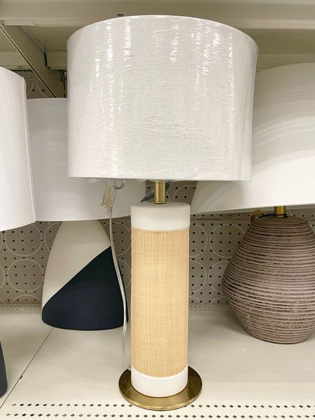 White & gold ceramic lamp with rattan-like detailing wrapped around the base! Lamps are such a fun way to add personality to a space! 💛

#LTKfindsunder100 #LTKstyletip #LTKhome