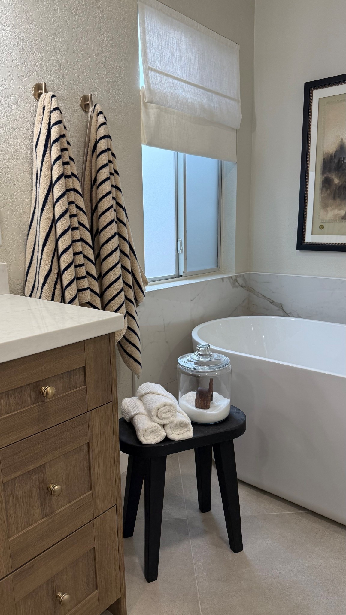 I’ve been LOVING these new bath towels 😍 so plush, soft, and quick drying. The thin striped pattern is so elevated
•
•
Bath towels, striped towels, hand towel, soft towels, bath accessories, bathroom decor, master bathroom, soaking tub, free standing tub, self care, vanity, wood vanity, changing brozne faucet, champagne bronze, neutral bathroom, bathroom design, bathroom inspo 

#LTKSaleAlert #LTKHome