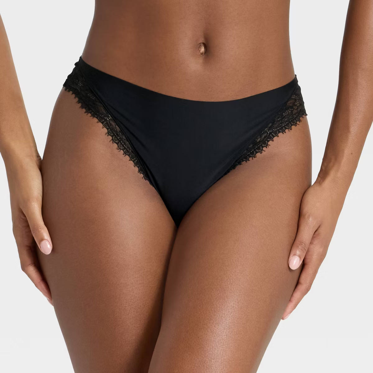 Women's Invisible Edge Lace Solid Thong Underwear - Auden™ Black L | Target