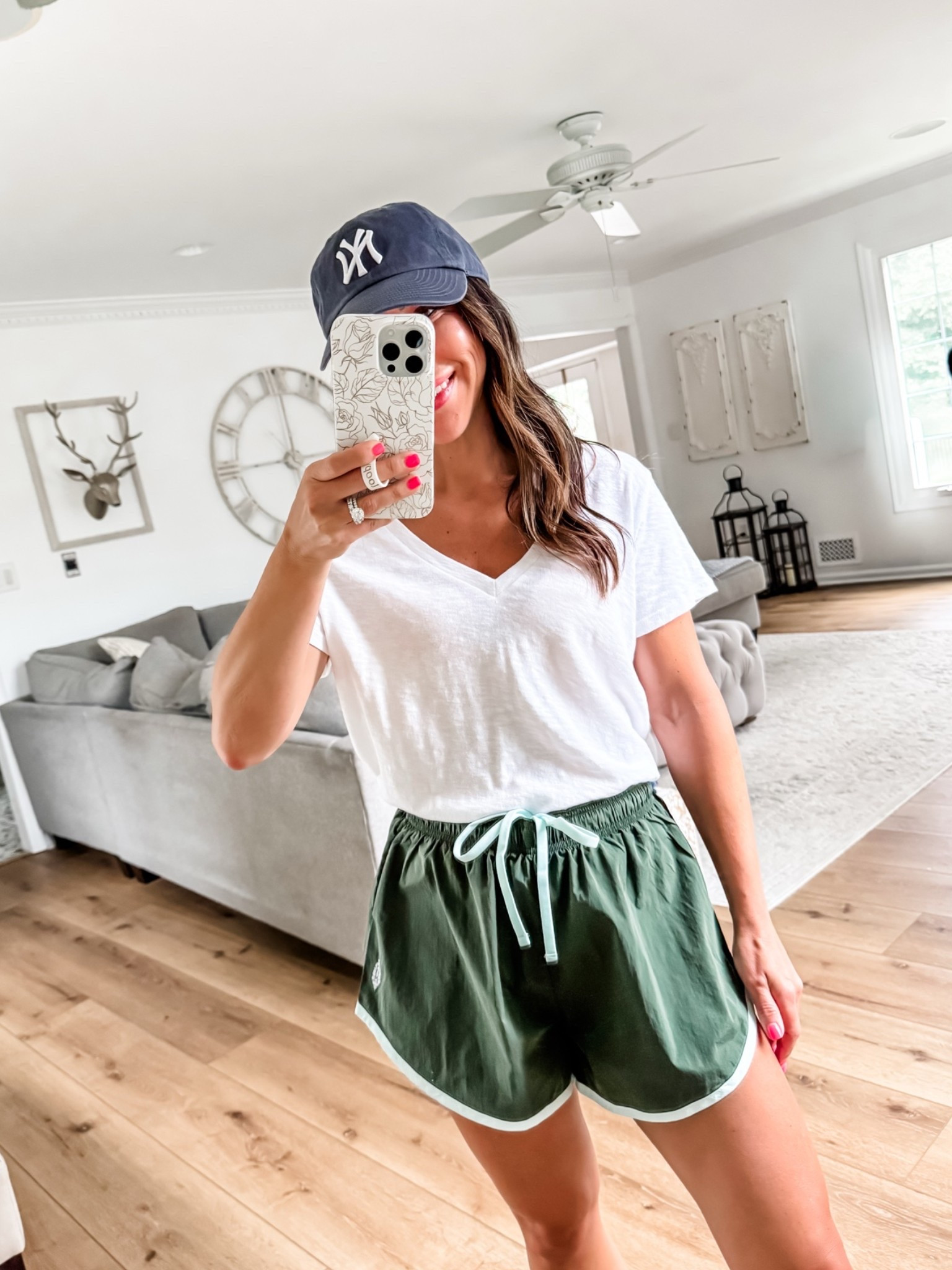 Small green shorts. White V-neck T-shirt XS.

#LTKOver40
