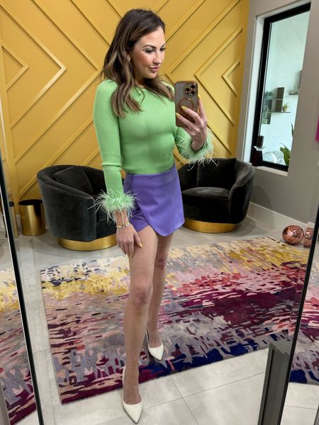 Palm Royale vibes!
Green stretchy sweater with feathers (also in off-white and taupe) for just $30

Paired with a lavender skort (linking similar) and classic white pumps!


#LTKParties #LTKStyleTip #LTKFindsUnder50