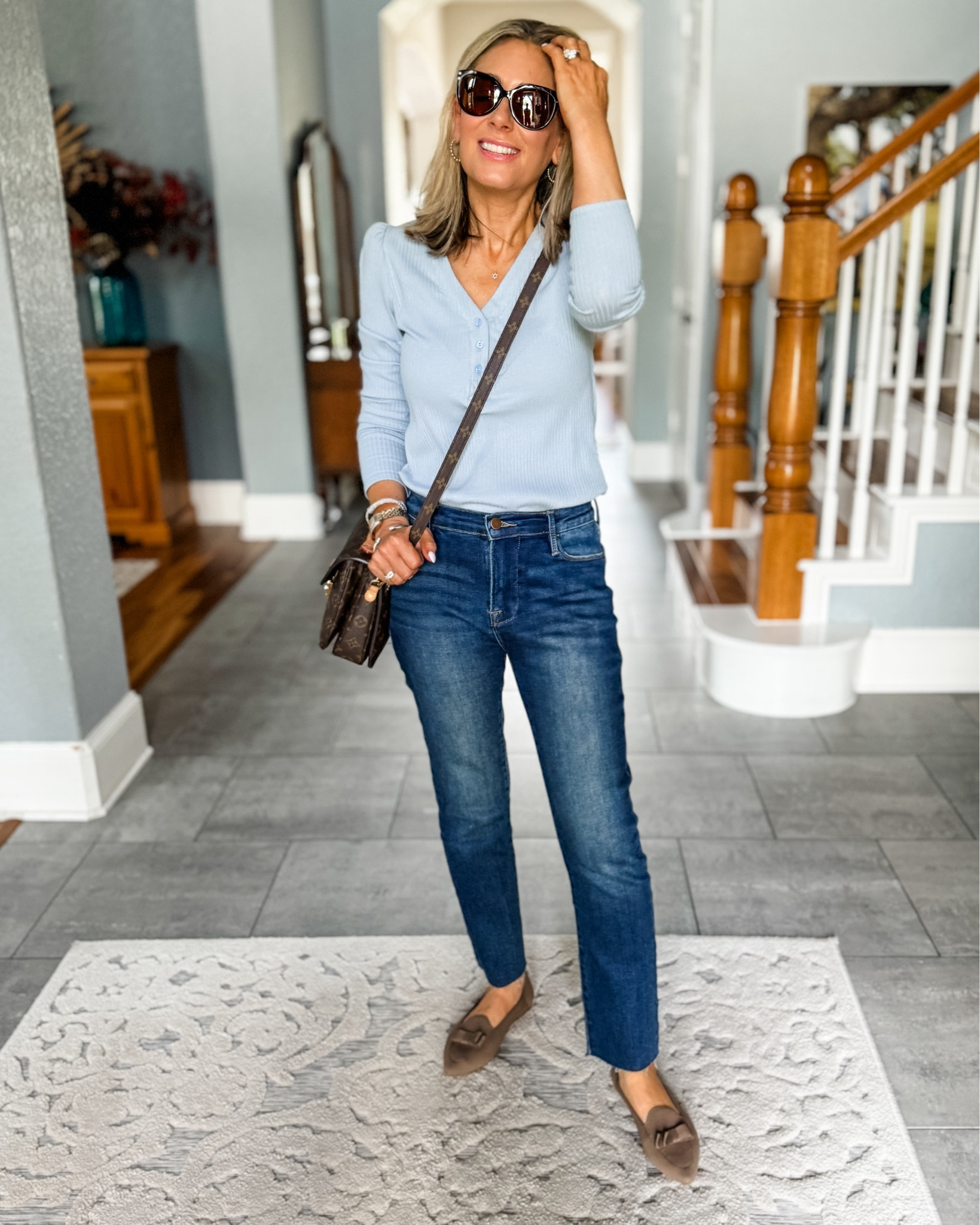 Some might think this is a boring outfit. I like that it’s fairly basic, with little details that make it feel a bit more put together. The top is a Henley, a staple of fall fashion, but it’s ribbed and has the most delicate puff to the shoulders. The jeans are a straight leg, but with a raw hem, and the shoes are a loafer style, but with the cutest little bows on the pointed toes. It always helps to add earrings and some sunglasses and a little lipstick to tie it all together! Use my code MARNIE15 to get the look for 15% off!

#casualoutfit #falloutfit #reallife #realstyle #jeans #knitloafers #gibsonlook #fashionover50 

#LTKOver40 #LTKSeasonal #LTKShoeCrush