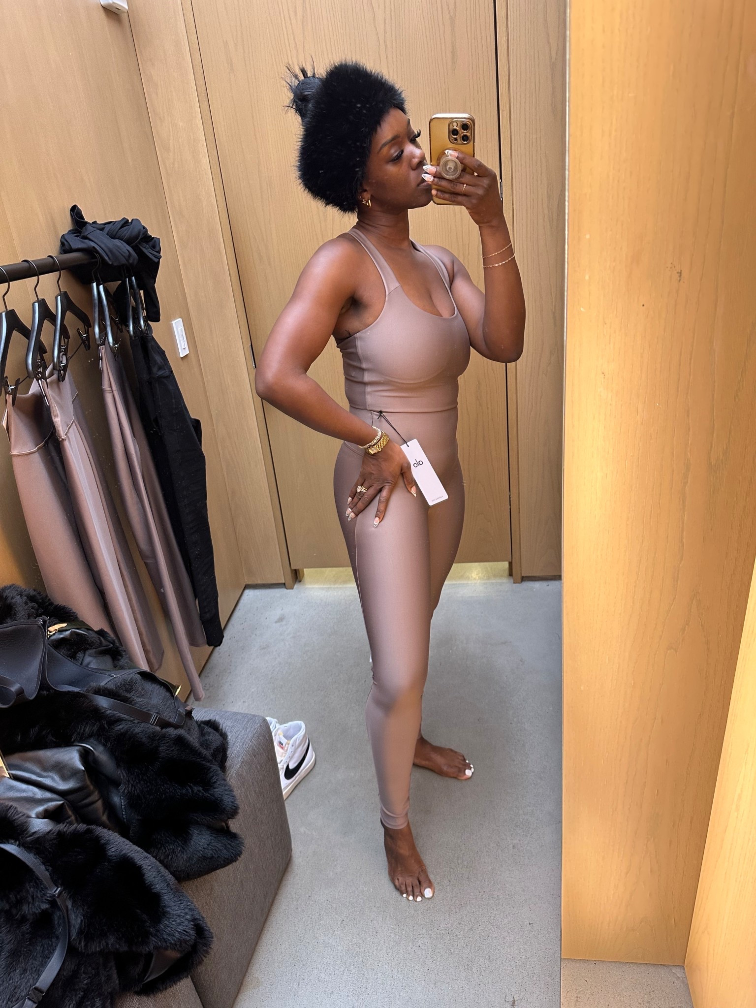 A sleek statement piece. This nude bodysuit with a metallic sheen adds the perfect touch of sophistication and shine to any outfit. Wear it solo or layer it up for a chic, polished look. 

#LTKSeasonal #LTKActive #LTKStyleTip