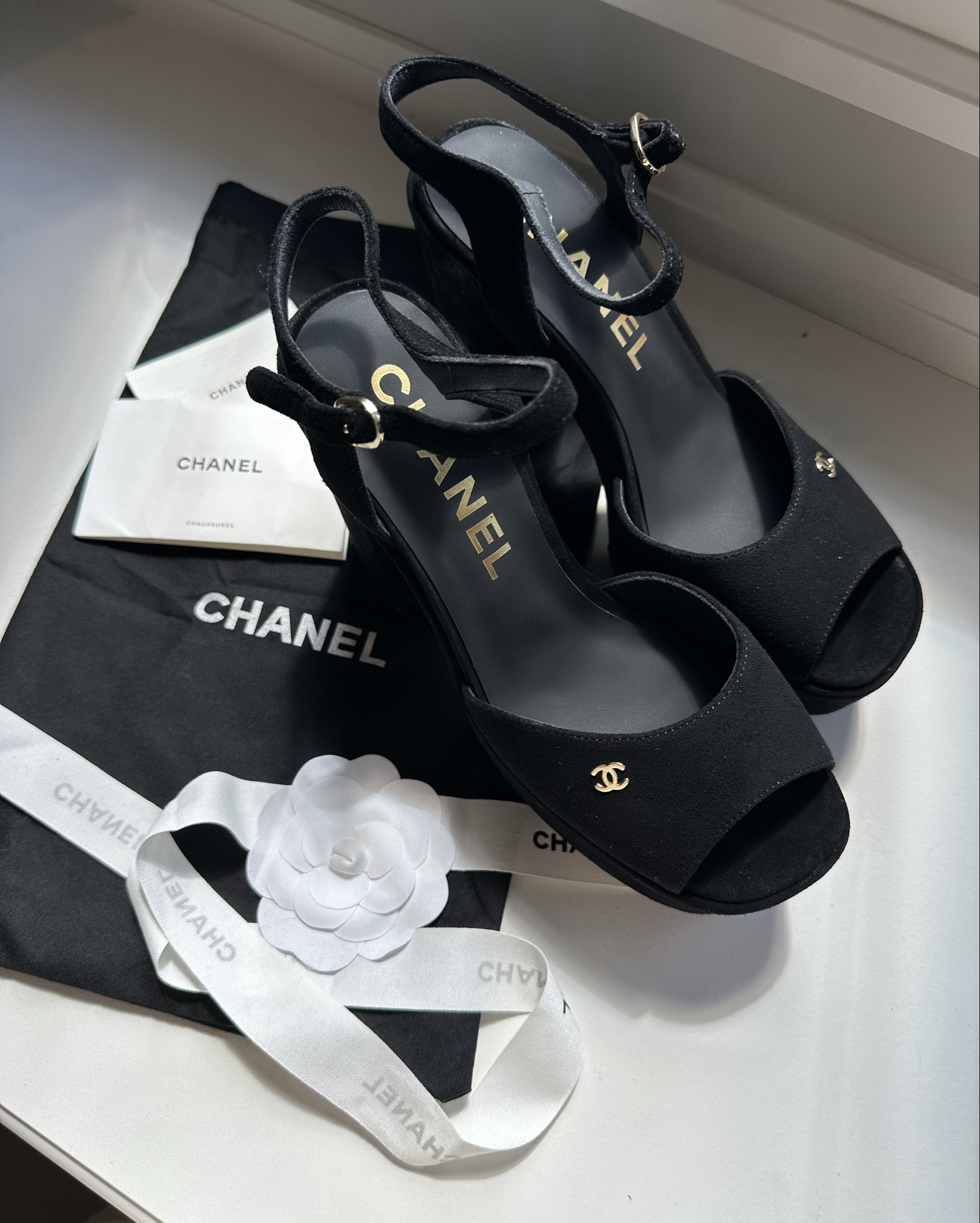 The most STUNNING vintage Chanel platform heels. These are so comfortable and come in so many different styles! 

Strap is a tad big, I wouldn’t say size down because the length of the shoe fits perfectly, but you may need to put a padded insole near to the toes to fill it out fully  

#LTKwedding #LTKsummer #LTKspring