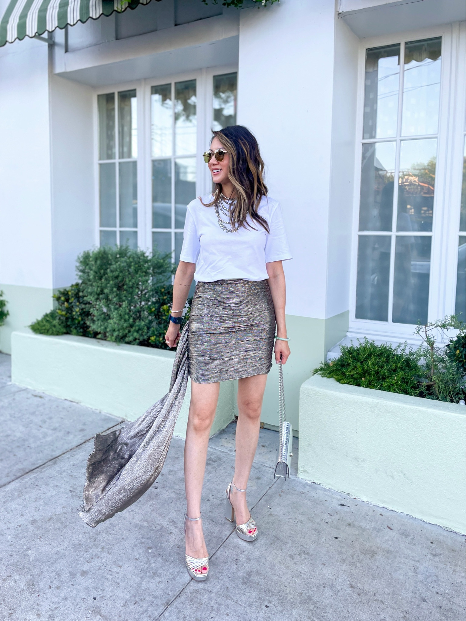 POV: the invite says cocktail casual ⚡️ What I wore to a wedding welcome party 🤍 Love the T-shirt top with the asymmetrical metallic skirt. My dress is sold out but I found a few on sale on Poshmark. 

Summer dress, wedding guest dress, date night outfit, summer outfit, T-shirt dress, asymmetrical skirt, The Stylizt 

 

#LTKParties #LTKStyleTip #LTKSaleAlert