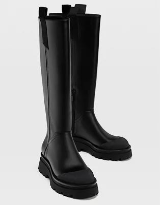 Stradivarius chunky sole high leg boots in black | ASOS (Global)