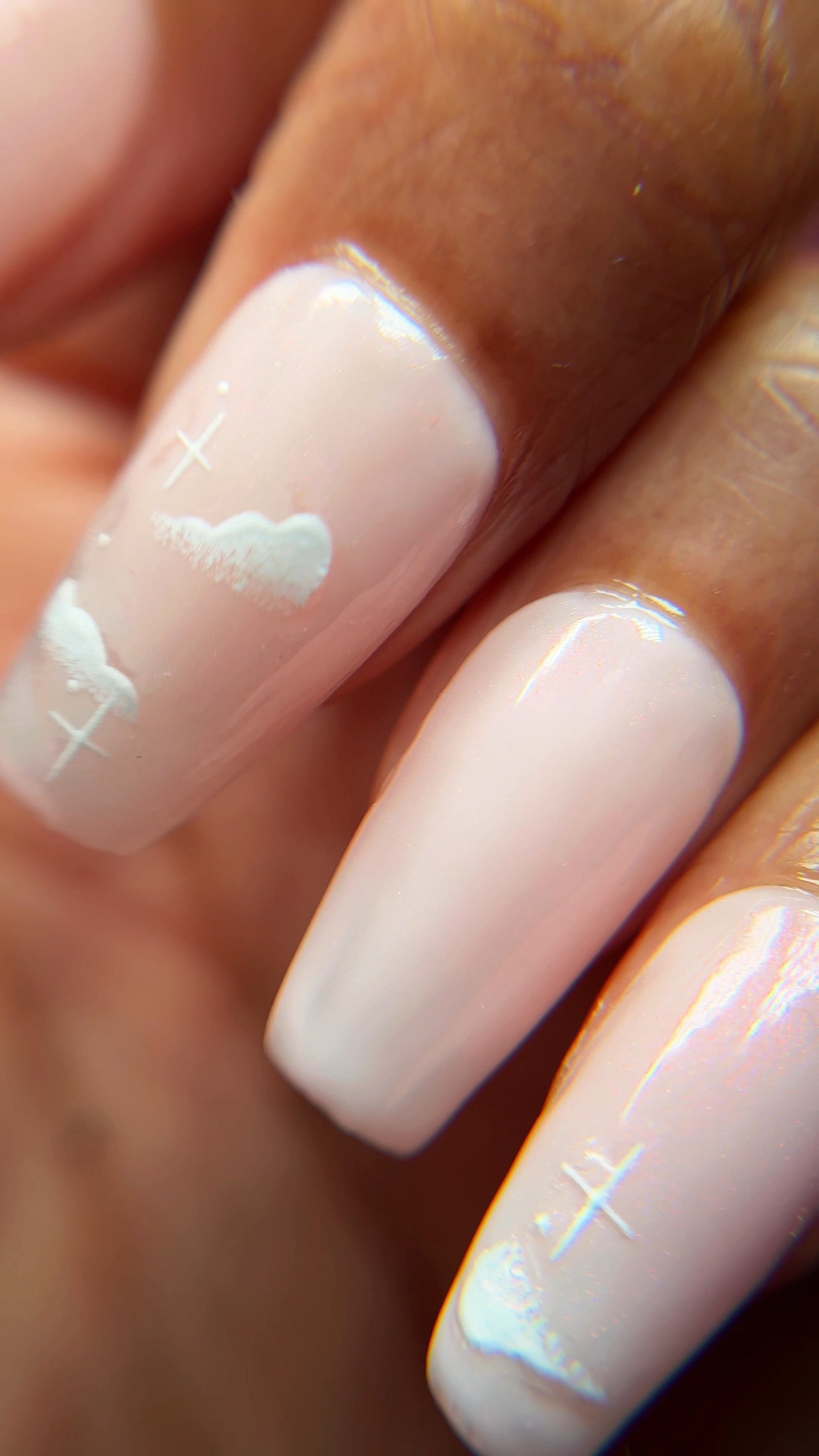 #AD How dreamy are these pink press on nails that I made? 😍☁️✨ Here’s how I did them!

Novo Ovo gifted me their new extra thick medium coffin shaped nails, which I used for this set. They are thicker at the tip so the nails feel really sturdy, and they come etched at the cuticle so you don’t have to file them 🙌🏾.

The kit comes with 14 sizes and 336 nails. The nails are currently $14.99 on Amazon, which is a great deal 🛍️✨. 

After I prepped the nails, I did a coat of Beetles base gel which I cured for 99 seconds 💡. 

Then I did two coats of  “pearly pink” gel polish by DND 💖. This is a really pretty milky pink shade.

I also applied some nail stickers with a cloud design, and finished my gel nails with a coat of heavenly iridescent gel topcoat in the shade “cherub” 👼🏾 by Apres.

I used regular nail glue to apply my press on nails, my favorite is the drip and clog proof nail glue by beauty secrets 🙌🏾😩.

#LTKVideo #LTKBeauty #LTKFindsUnder50