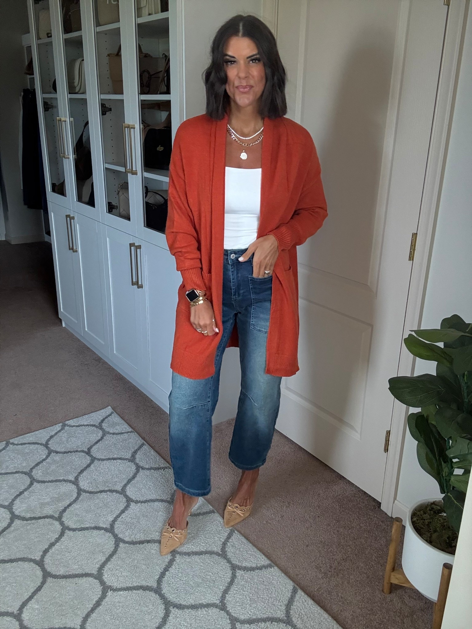 Size small in cardigan and tank, size 4 in jeans

#LTKSeasonal #LTKFindsUnder100