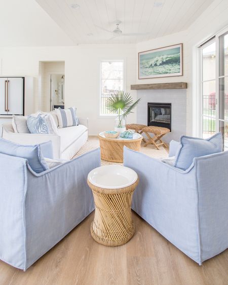 *Most of this space is 20% off today with code SALE* Our Omaha pool house living room area including our indoor/outdoor sofa and swivel chairs, round coffee table, Frame TV, woven rug, coastal decor, subtle modern, ceiling fan, woven x-base stools, floating shelf mantle, and blue and white pillows. 

family room ideas, pool house, serena and lily, area rug, blue and white decor, patio furniture, simple decor, home decor, amazon décor, living room decor, family room décor, targetfanatic, target style, amazon home, amazon finds, coffee table décor, serena and lily sofa, target finds, target home, family room #ltkfamily #ltkseasonal  

#LTKstyletip #LTKfindsunder50 #LTKfindsunder100 #LTKhome #LTKsalealert #LTKfamily #ltkseasonal


#LTKSaleAlert #LTKSeasonal #LTKHome