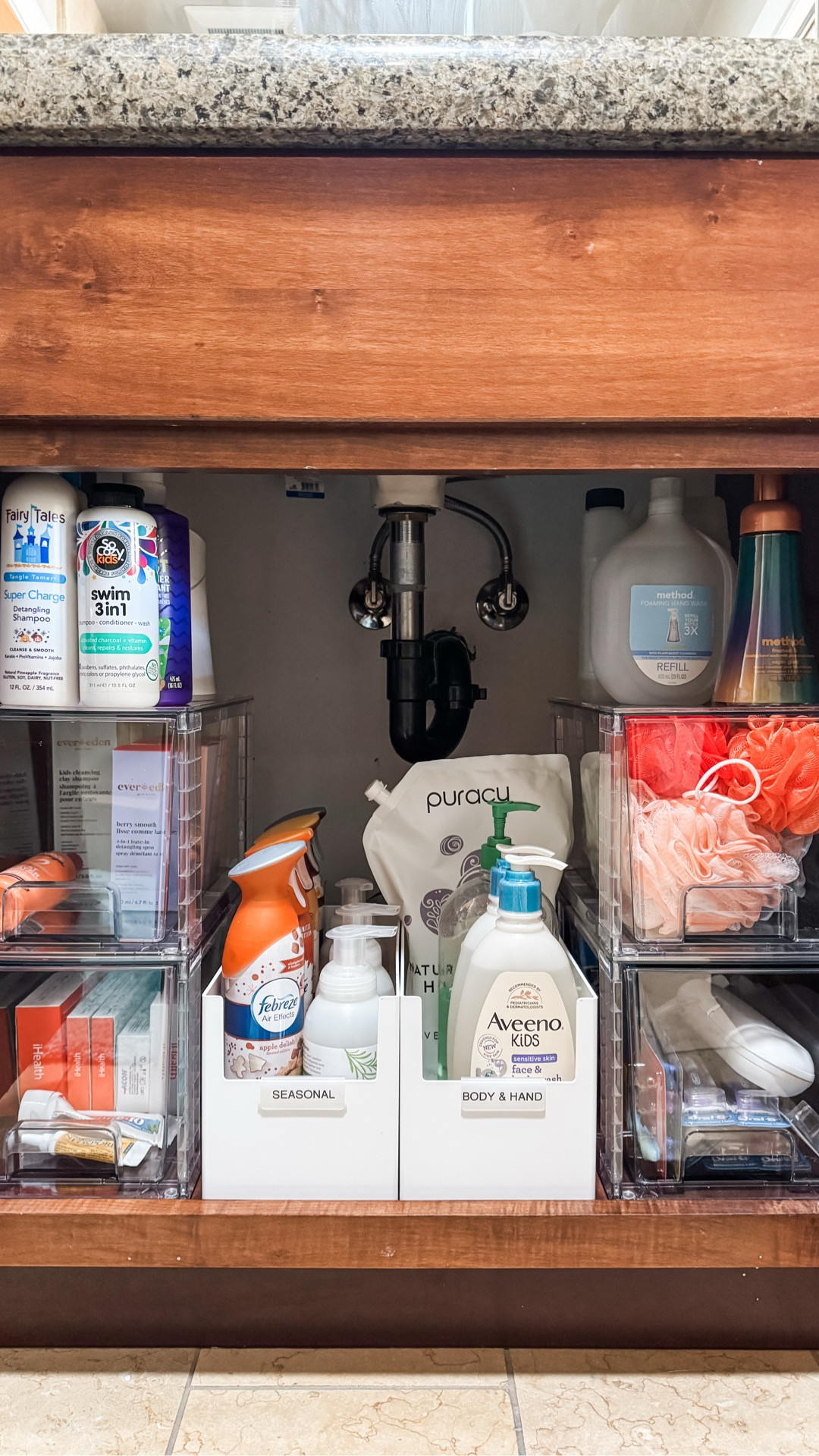 Don’t stress about the under sink pipe in your bathroom. You can easily organize this space and work around it by creating a modular system just like this. I used four stacking clear drawers and two deep organizers in the middle to make the most efficient use of this space!

#LTKFamily #LTKHome