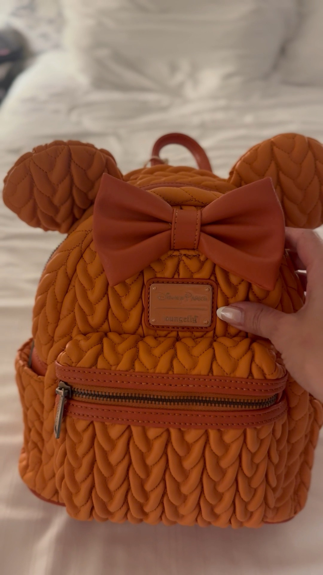 fall magic in a bag 🍂🎀 this cozy knit-inspired mini backpack is giving all the disney vibes. linked on my LTK #ltkstyle #ltkbags #ltkdisney