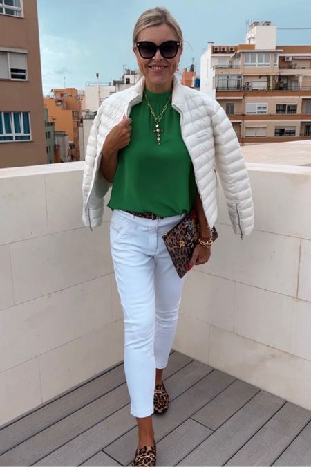 Green & white ➕ 🐆💚🤍 
.
.
.
💚🤍 Das Outfit ist verlinkt in der LTK -Shopping-App /-LINK in der BIO und in meiner Story. 
⤵️
💚🤍Follow my shop @marti_7447 on the @shop.LTK app to shop this post and get my exclusive app-only content! #liketkit #LTKstyletip 
.
.
.
#greenblouse #greentop #greenshirt #whitetrousers  #whitepants #animalprint #animalprintshoes #animalprintlover #dolcegabbanabelt #duvetica #pufferjackets #downjacket  #outfitidea  #streetstyledeluxe  #outfitinspiration #outfitideas4you #casualstyleforwomen #casualchicstyle #fashioninspiration #womanstreetstyle  #styleatanyage #womanwithstyle #elegantstyle #femininestyle #fashionable40s #mallorcagram #palmademallorca #rooftopvibes 
.
.
.
.
💚Armbänder @magiclaze 🫶 ✨ 20% RABATT auf alles mit „marti20“✨💚 KREUZKETTE COMMING SOOOOOOON! 💚🫶only by @magiclaze 💚
.
.
𝒲𝑒𝓇𝒷𝓊𝓃𝑔 𝒜𝒹.*



#LTKSeasonal #LTKshoecrush #LTKstyletip