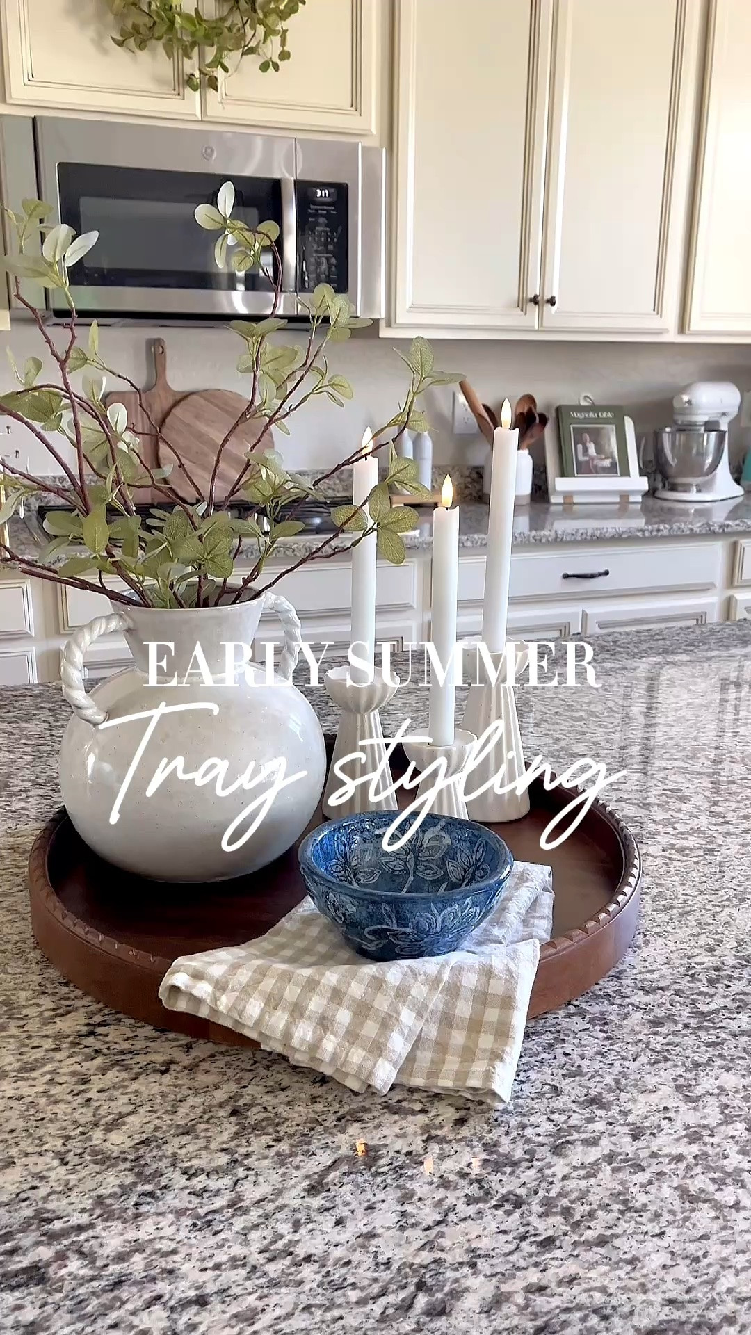 Early summer tray styling!

My favorite round wood tray, greenery, flameless candles, this adorable neutral gingham towel, and this beautiful blue bowl all help create this simple summer tray that is the perfect addition to my kitchen island or table centerpiece.

#traystyling #centerpiece #kitchenstyling #kitchendecor #summerdecor #homedecor

#LTKSeasonal #LTKHome