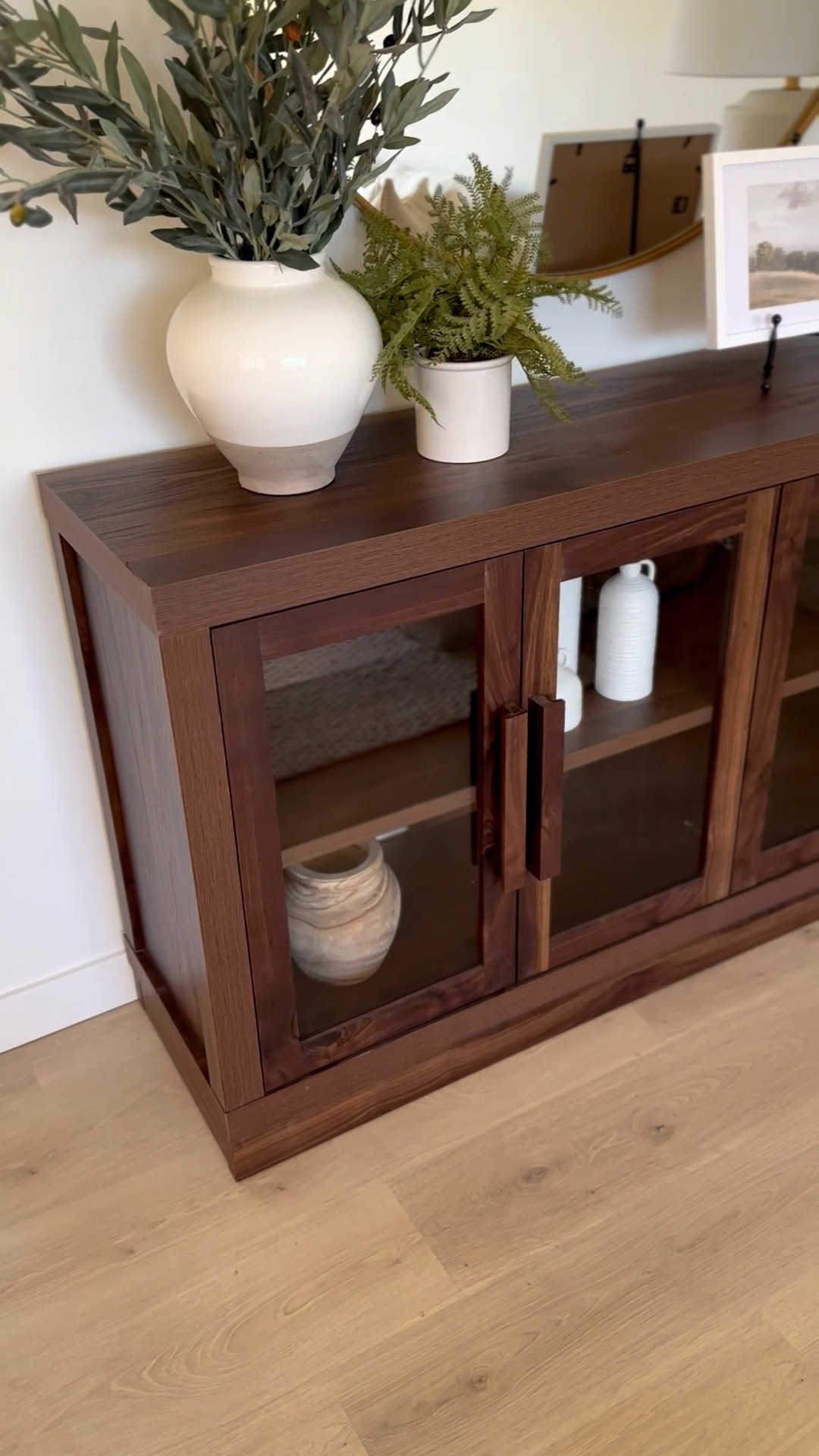 Pottery Barn style — Walmart budget!

This cabinet comes in 3 colors and smaller sizes! Sharing more of my favorite cabinets. You can always double up or do 3 of the smaller sizes if you need something larger.

Glass cabinet, tv cabinet, buffet table, sideboard, cabinets, shelving, console table, designer, design help, design ideas 

#LTKHome