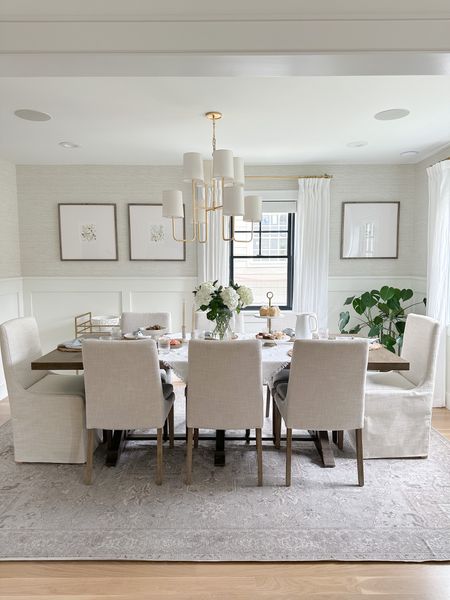 Neutral gray, white, and beige dining room design. Our upholstered dining chairs were a lucky Homegoods find but I linked similar finds! Our rug is washable. Our brass dining room chandelier is a classic and timeless 

#LTKstyletip #LTKhome #LTKFind