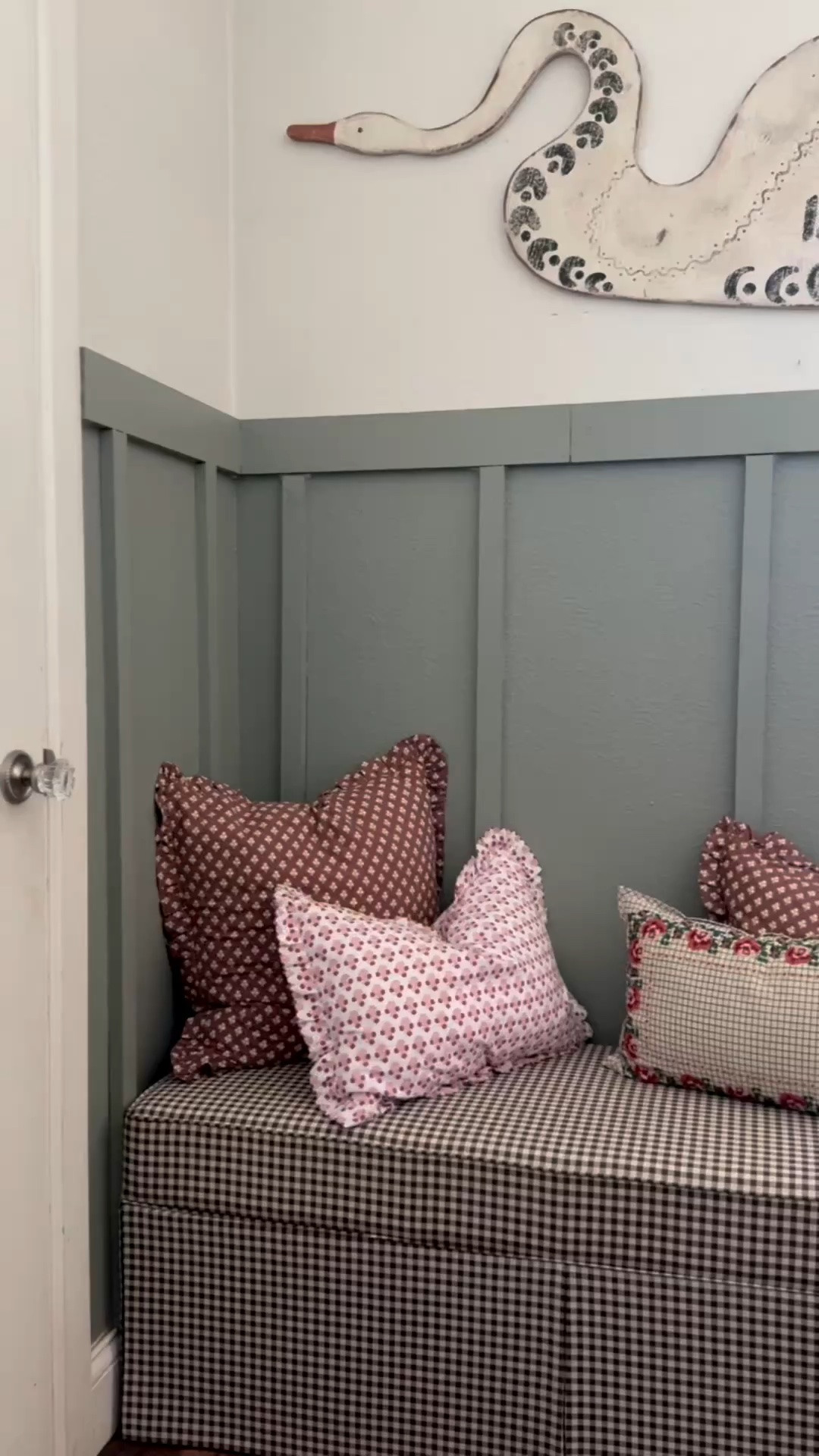 The storage bench of my dreams!!! It’s a beautiful skirted upholstered bench in a gingham pattern. Love!!