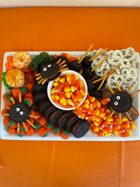 I try to do this super easy Halloween charcuterie/treat platter every Halloween for my kids!🧡

What I used to make this:
• Tangerine Pumpkin (tangerine oranges with a half a pretzel poked the middle) 
•  Oreo spiders (Oreo cookie with edible eyes and I use a little bit of frosting to stick them on and use pretzel sticks as the legs 
• traditional candy corn
• pumpkin candy corn
• witch brooms  (small Reeses cup and a pretzel stick)
• mummy pretzels ( white chocolate covered pretzels with edible eyes, use frosting to stick the eyes on) 
• Reese’s peanut butter pumpkins 
•green and orange skittles (because my kids love skittles)
• green and orange lifesavers (again because my kids love anything gummy)

#LTKparties #LTKkids #LTKSeasonal