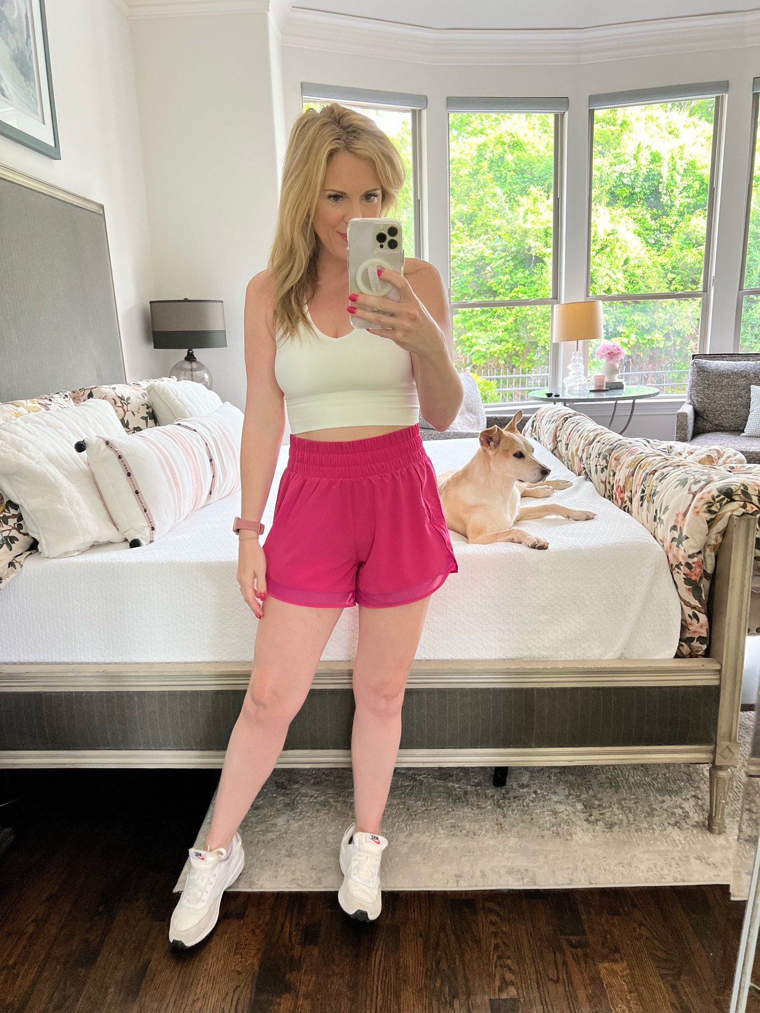 Workout look 
Spring workout look 
Athleta shorts 
Hot pink workout shorts 
White cropped sports bra 
Athleta top 
Mesh runner shorts 
White Nike sneakers 

#LTKfindsunder100 #LTKfitness #LTKActive