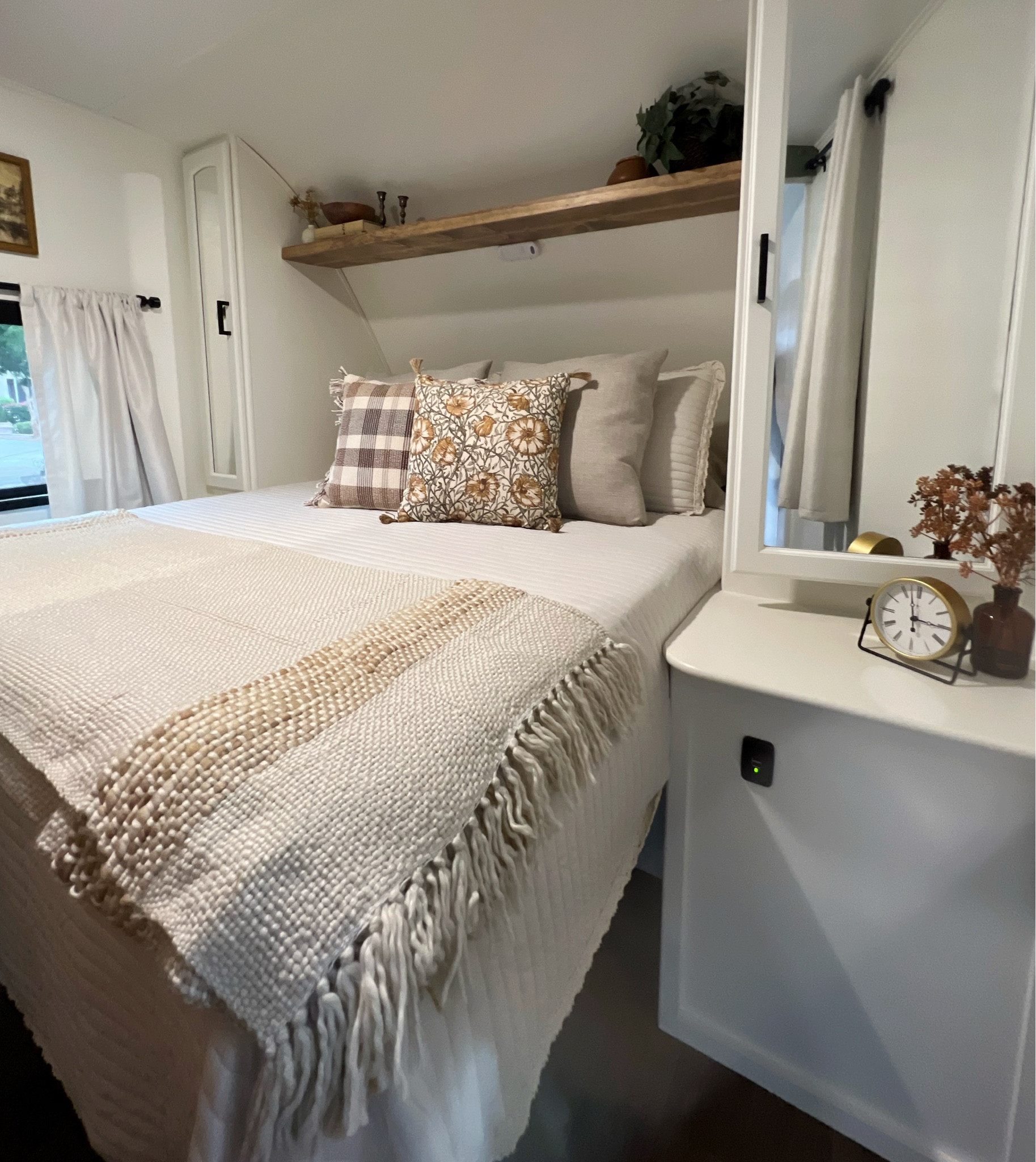 Camper bedroom space decorated for fall with affordable finds. RV, Target, Threshold, Studio McGee, Hearth & Hand, TJ Maxx, throw pillow, candle, faux plant, floral arrangement, clock, plaid, modern farmhouse, cottage, fall decor, bedroom, camping, glamping

#LTKSeasonal #LTKhome #LTKstyletip