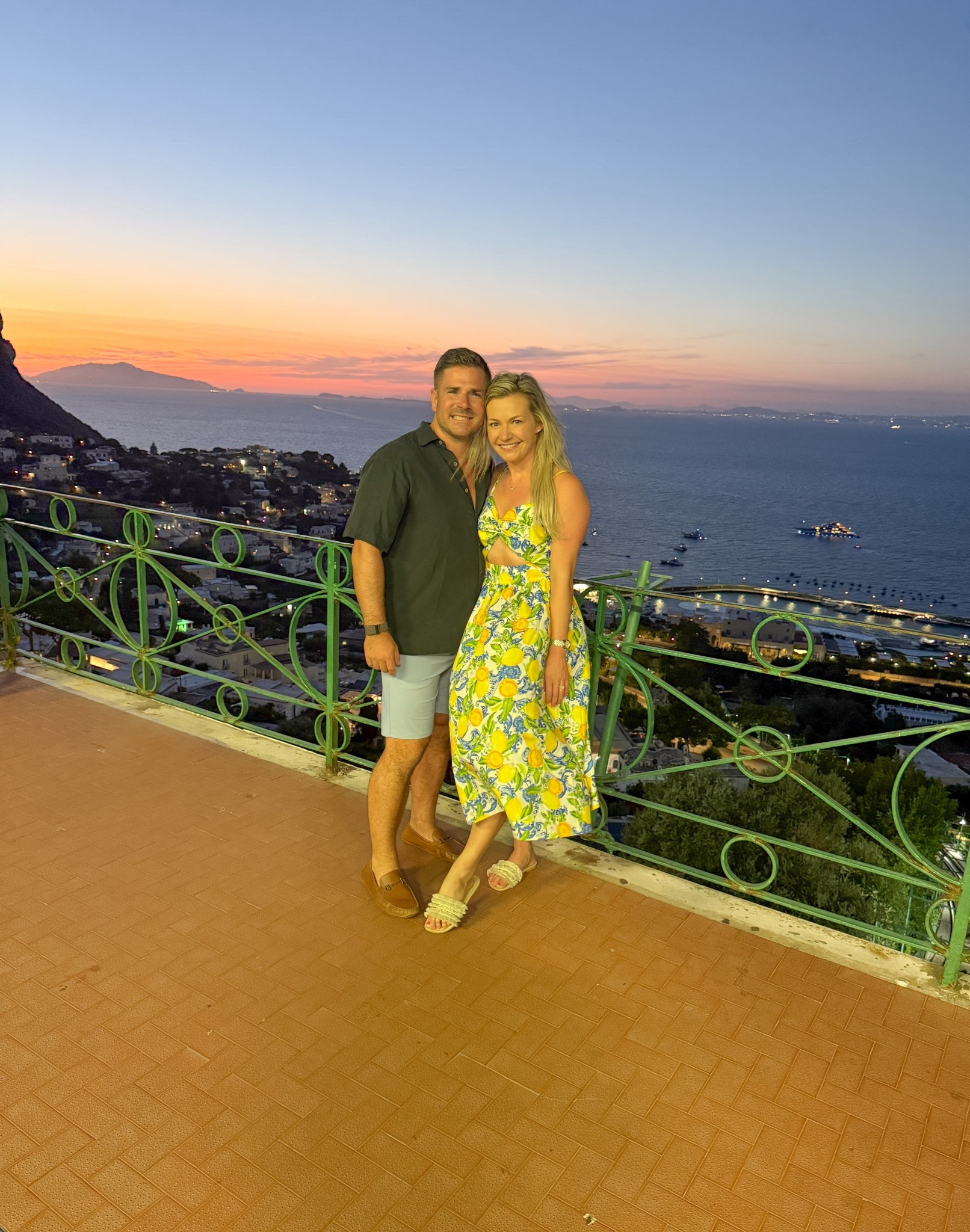 Date night on the Amalfi Coast 🍋✨ When life gives you lemons… wear them in Capri! Matching in Positano with coastal views, sunset cocktails, &amp; all the honeymoon feels. Would you rock matching outfits on vacation? Save this for your next Italy trip &amp; follow @kitchensinkit for more Amalfi Coast style &amp; travel inspo! ⸻ lemon print dress Capri, Capri date night outfits, Positano honeymoon outfits, Amalfi Coast couples fashion, Amalfi Coast honeymoon outfits, Italy honeymoon style, lemon dress Italy, Amalfi Coast fashion inspiration, what to wear in Positano, honeymoon outfit ideas Italy, Amalfi sunset outfits, Italy couples travel outfits, Amalfi Coast packing list, lemon print couples outfits, luxury honeymoon outfits Italy

 

 

#LTKStyleTip #LTKTravel #LTKMens