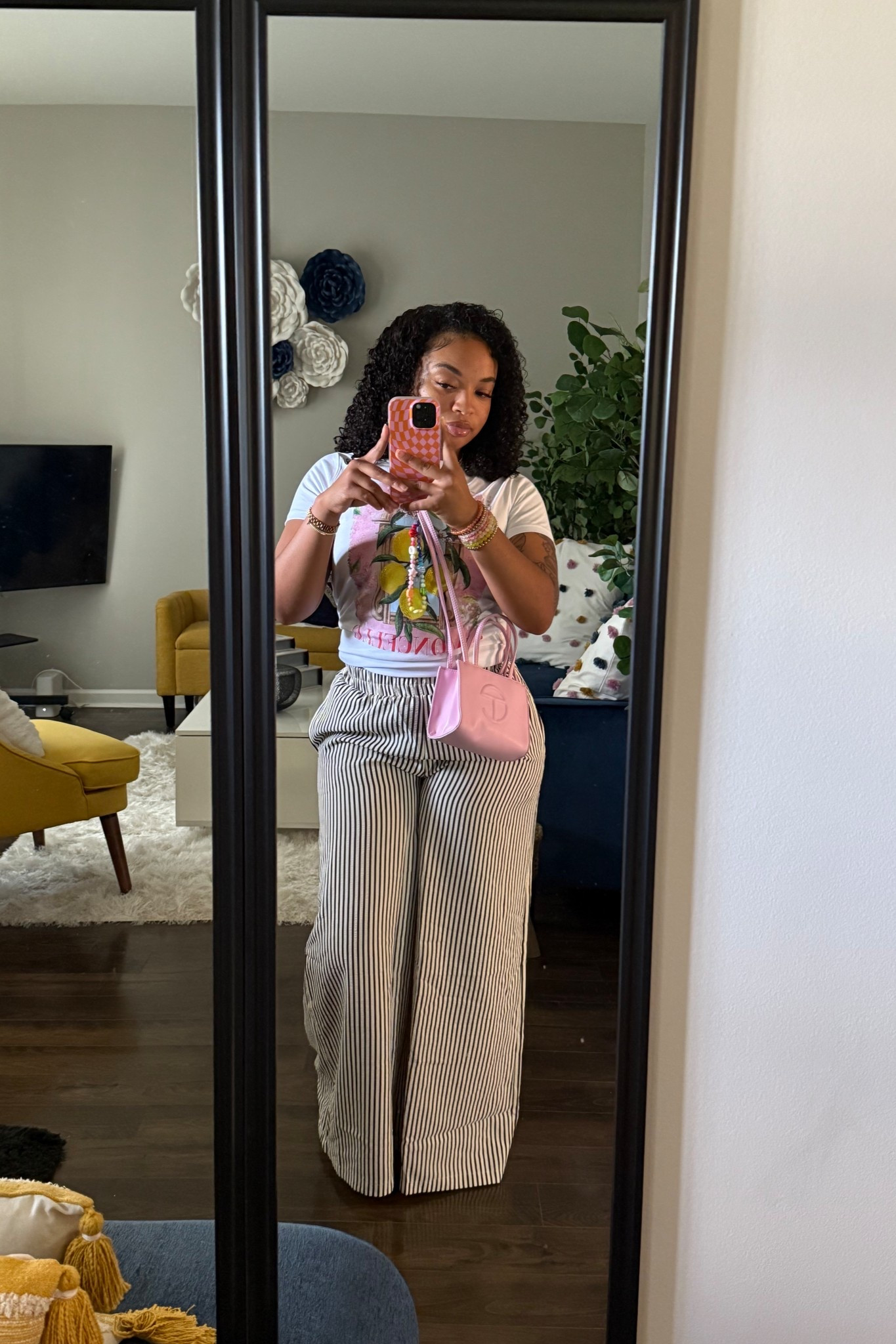 outfit of the day. chill but still cute for a birthday party. 
shirt is from Tjmaxx  
Bag is a small telfar 
Pants are actually from TikTok shop 
Flip flops from target
All jewelry from Amazon/shein/tjmaxx
