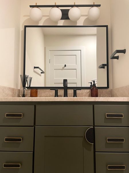 Juniper + amber will always be a winning combo in my book! Case in point? This dreamy vanity situation 🏆 Modern Austin bathroom remodel by @holleyhouseco

#LTKtravel #LTKstyletip #LTKhome