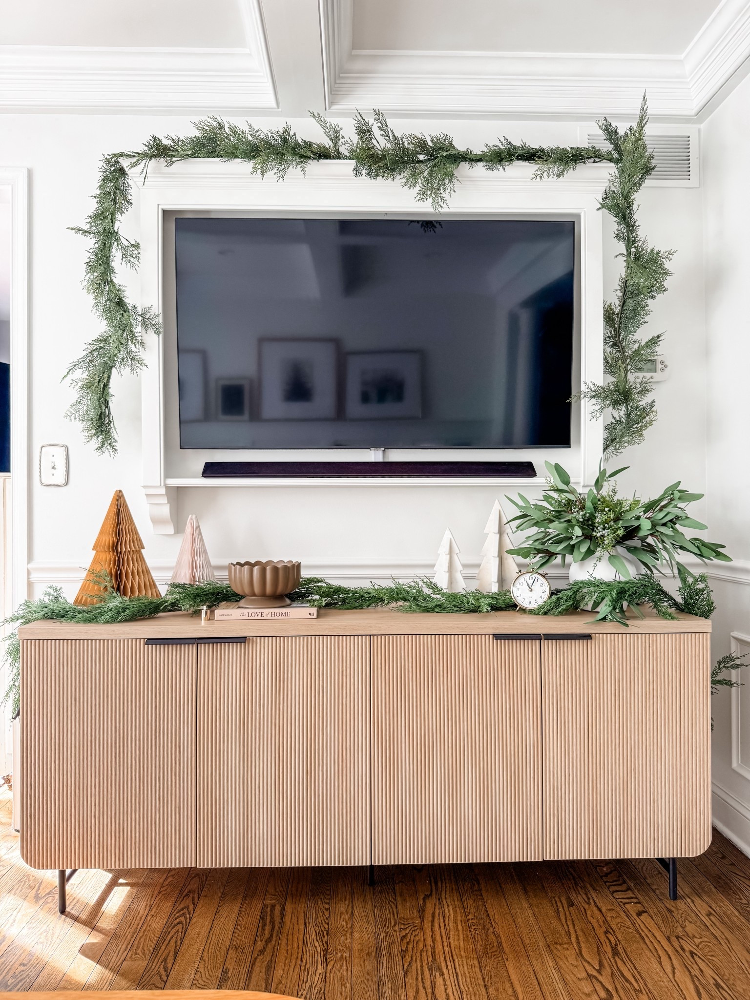 Walker Edison Fluted Sideboard 
Buffet console
Coastal oak sideboard
Tv media console table
Reeded console table
Cedar garland 
Christmas decor
Living room furniture
Honeycomb paper tree
Artificial Eucalyptus stems 
Footed candle
5 wick holiday candle
Coffee table book
Scalloped footed candle
Brass table clock 
Console table decor
Amazon console 

#LTKStyleTip #LTKHome #LTKHoliday